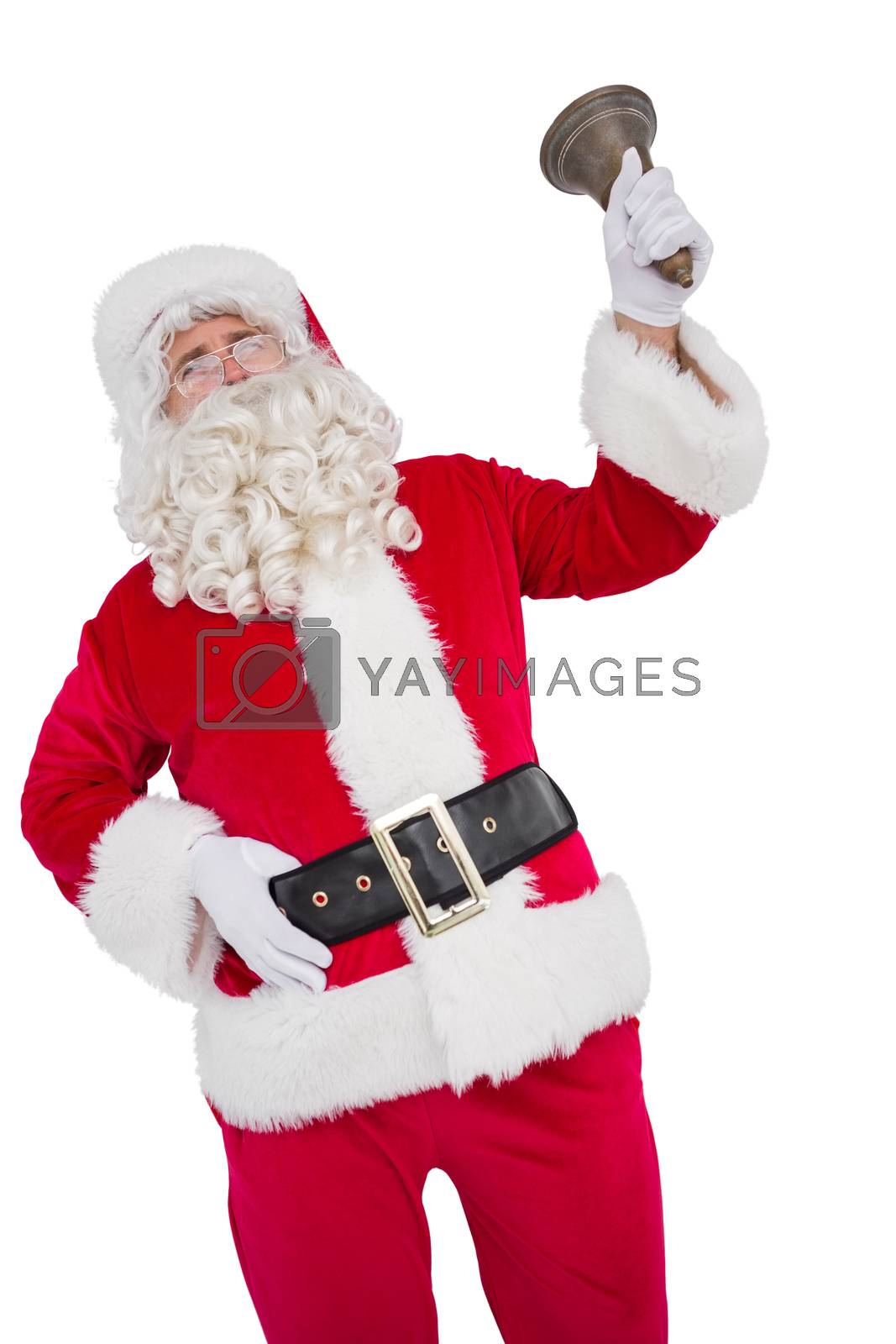 Royalty free image of Happy santa ringing a bell by Wavebreakmedia