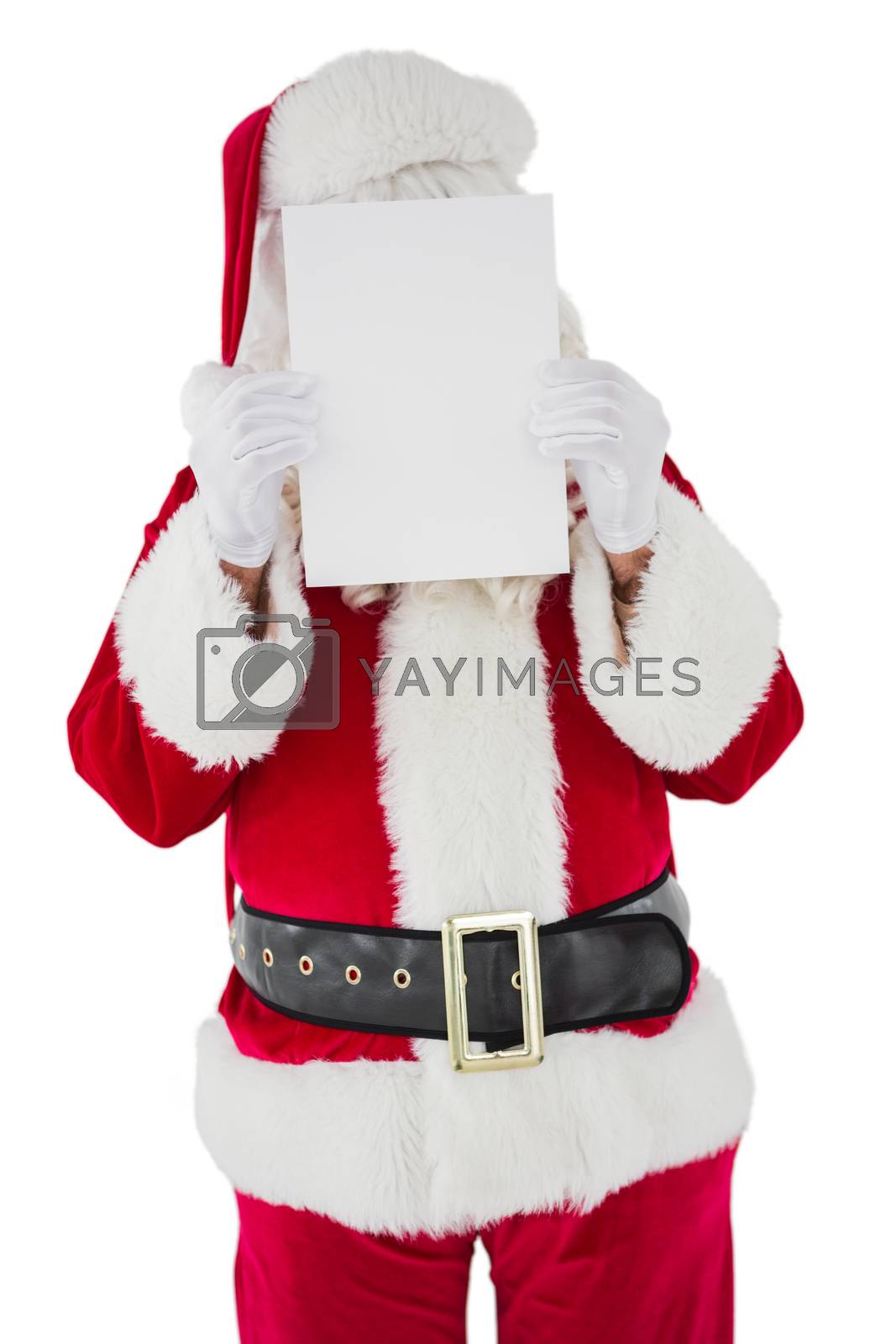 Royalty free image of Santa claus presenting card  by Wavebreakmedia
