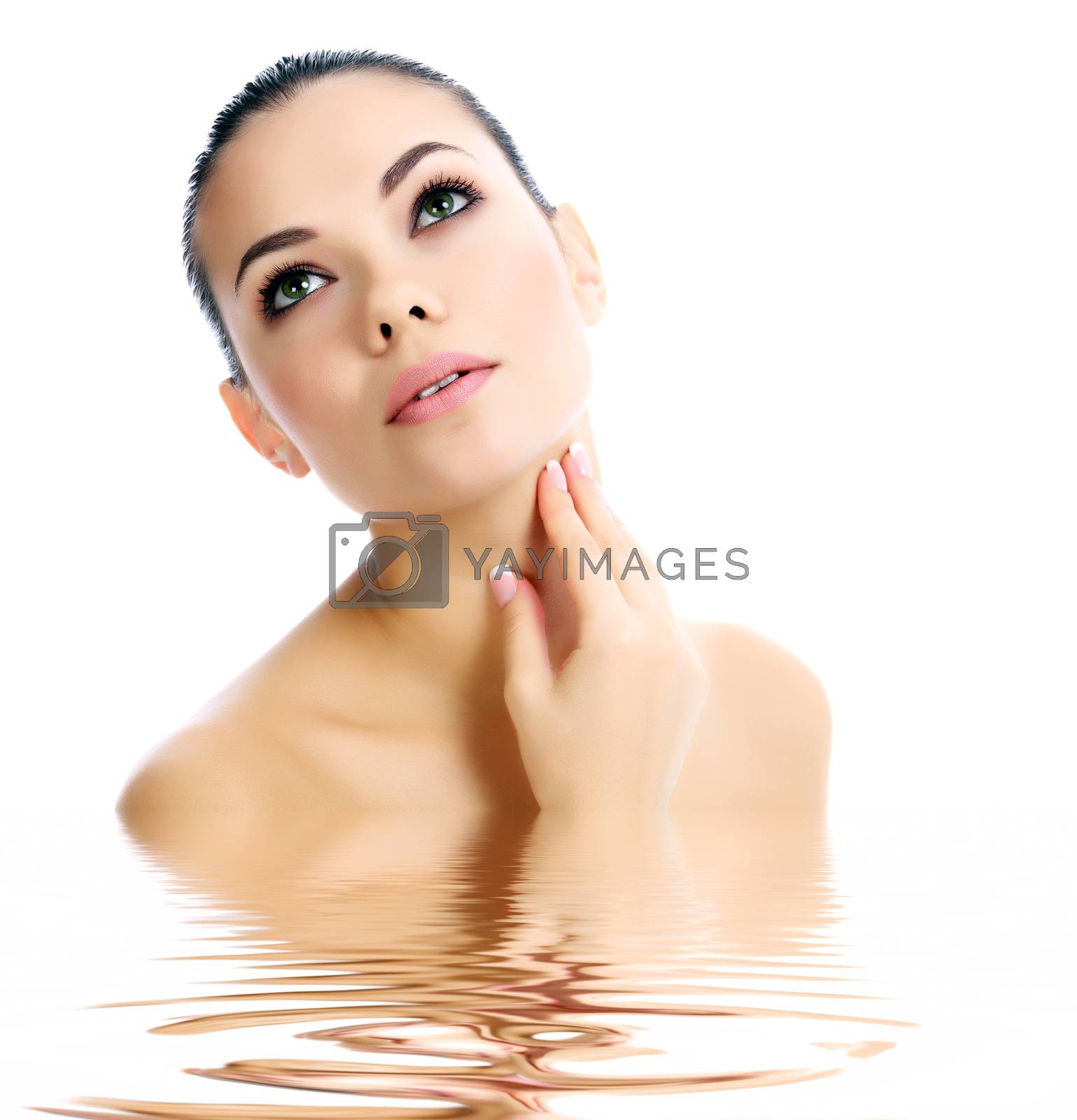 Royalty free image of Beautiful female with clean fresh skin, white background by Nobilior