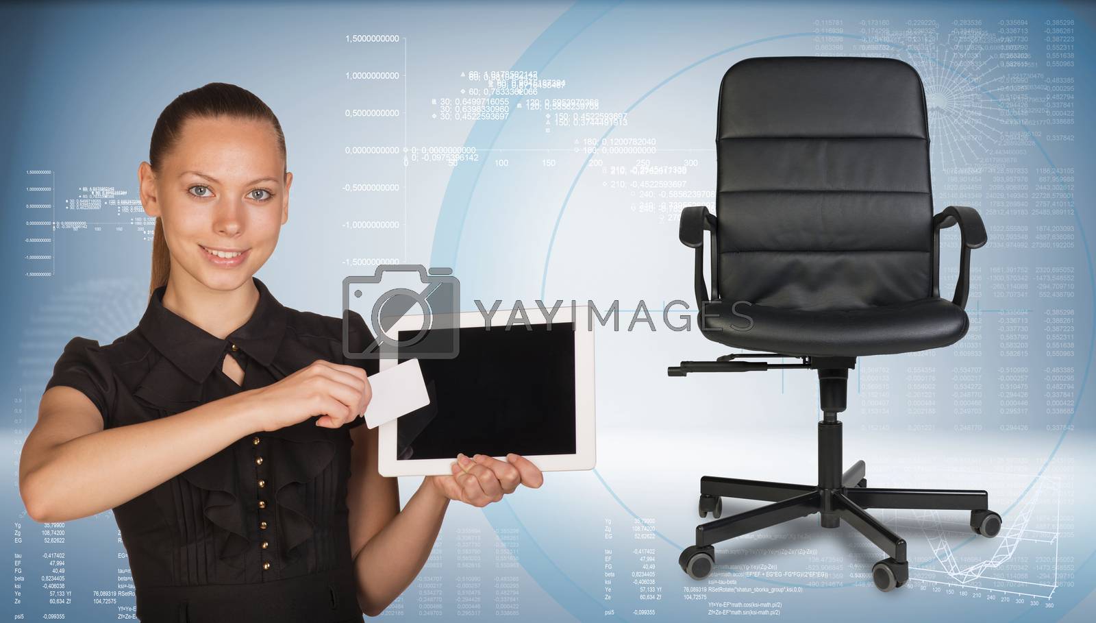 Royalty free image of Businesswoman holding tablet PC and business card. Office chair beside by cherezoff