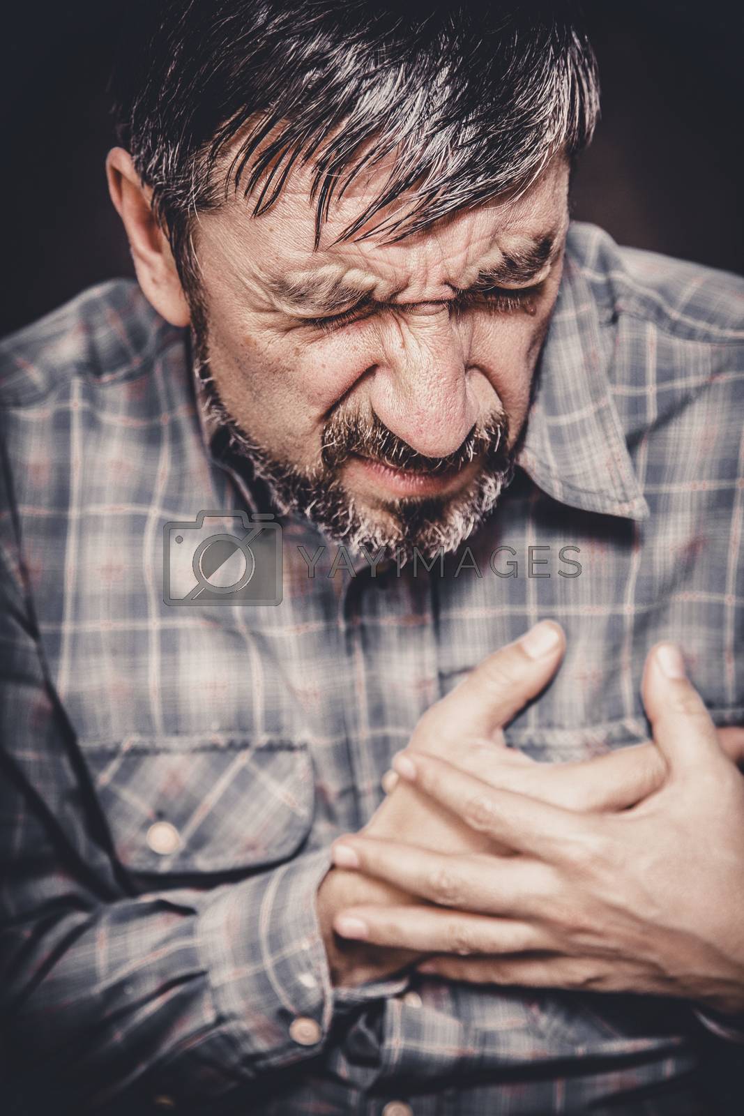 Royalty free image of Man having chest pain by anelina