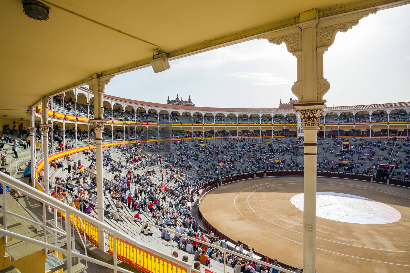 Royalty free image of Plaza de Toros de Las Ventas interior view with tourists gatheri by PixAchi