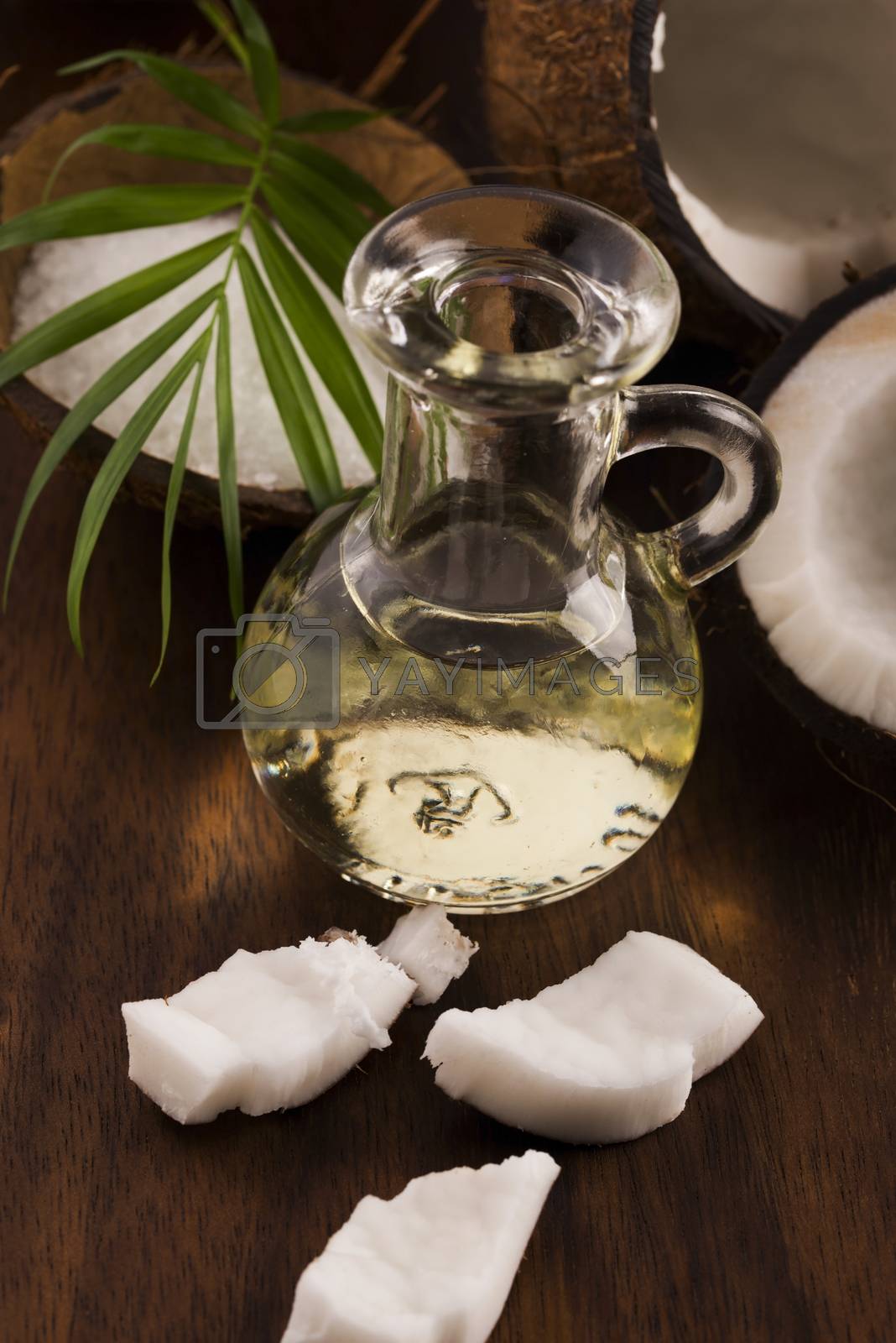 Royalty free image of Coconut oil for alternative therapy  by joannawnuk