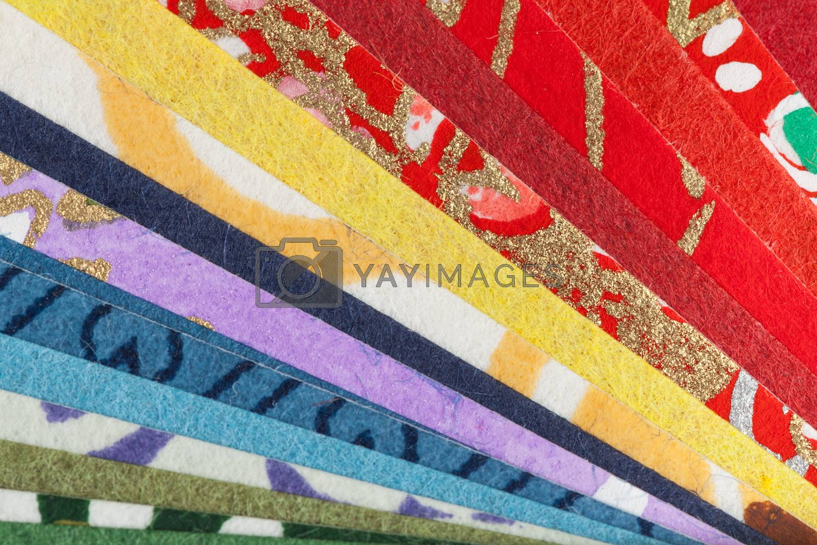 Royalty free image of Abstract colorful origami paper pattern texture stacked layer re by FrameAngel