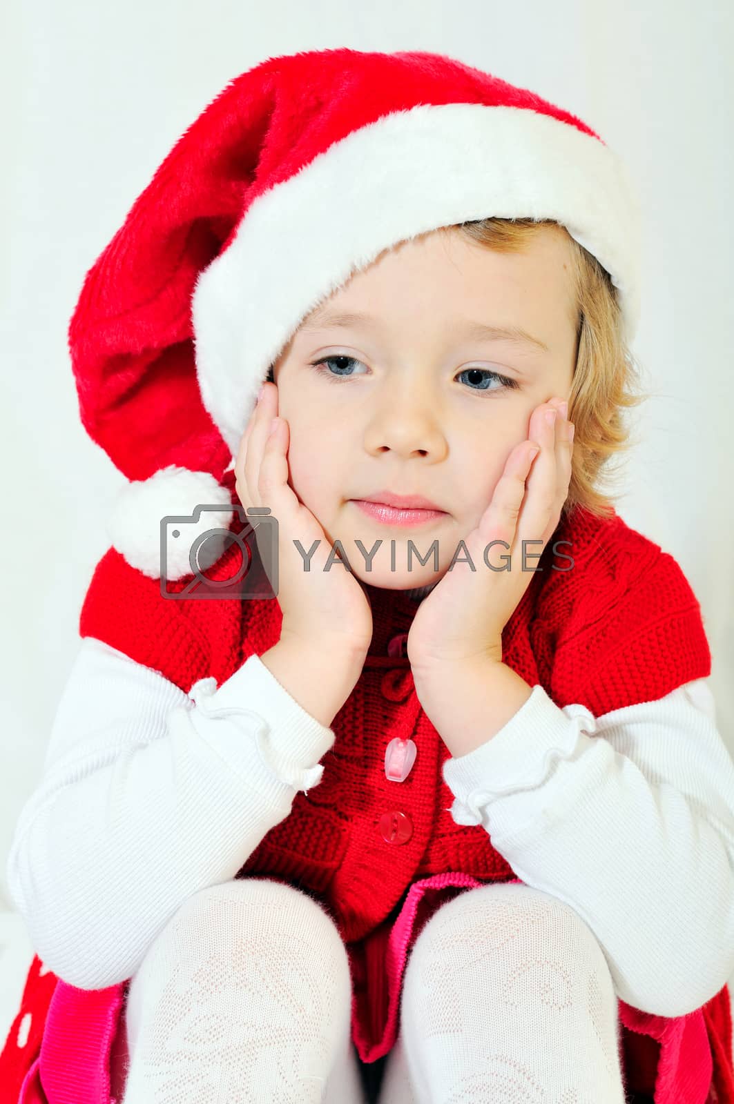 Royalty free image of thoughtful santa helper by Reana