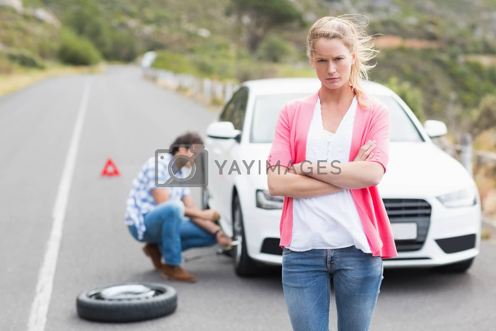 Royalty free image of Couple after a car breakdown by Wavebreakmedia