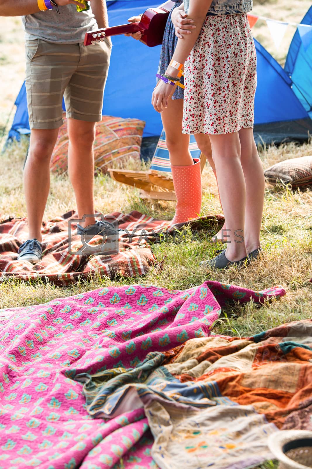 Royalty free image of Hipsters having fun in their campsite by Wavebreakmedia