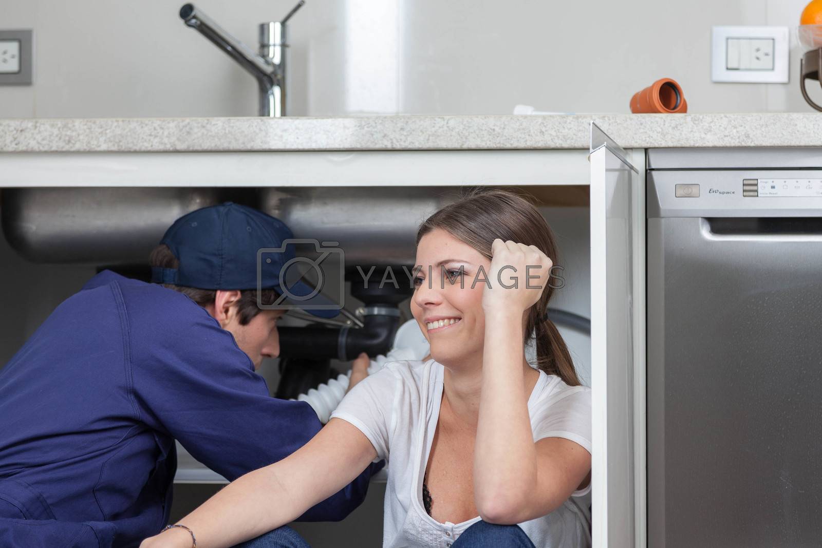 Royalty free image of Plumber thinking and smiling by ifilms