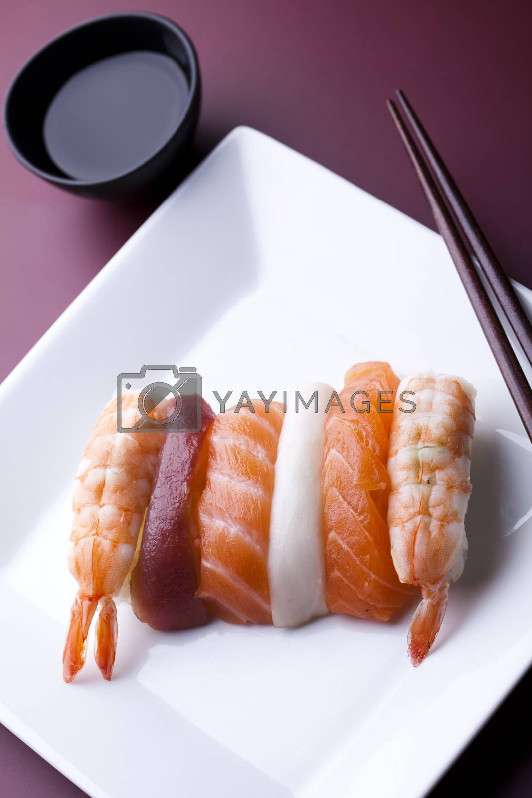 Royalty free image of Collection of sushi, oriental cuisine colorful theme by JanPietruszka
