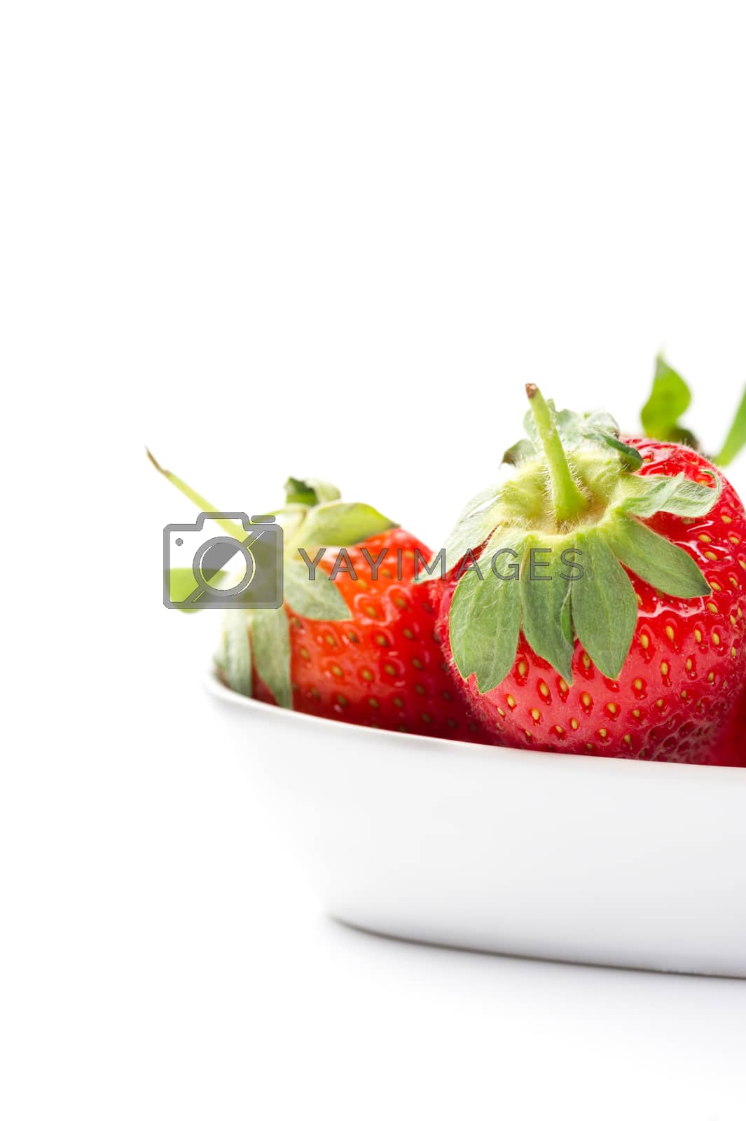 Royalty free image of Juicy ripe red home grown strawberries in a bowl by MOELLERTHOMSEN