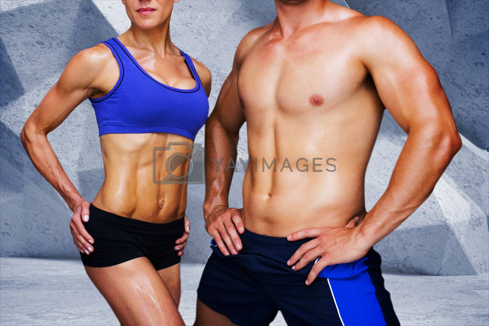 Royalty free image of Composite image of bodybuilding couple by Wavebreakmedia