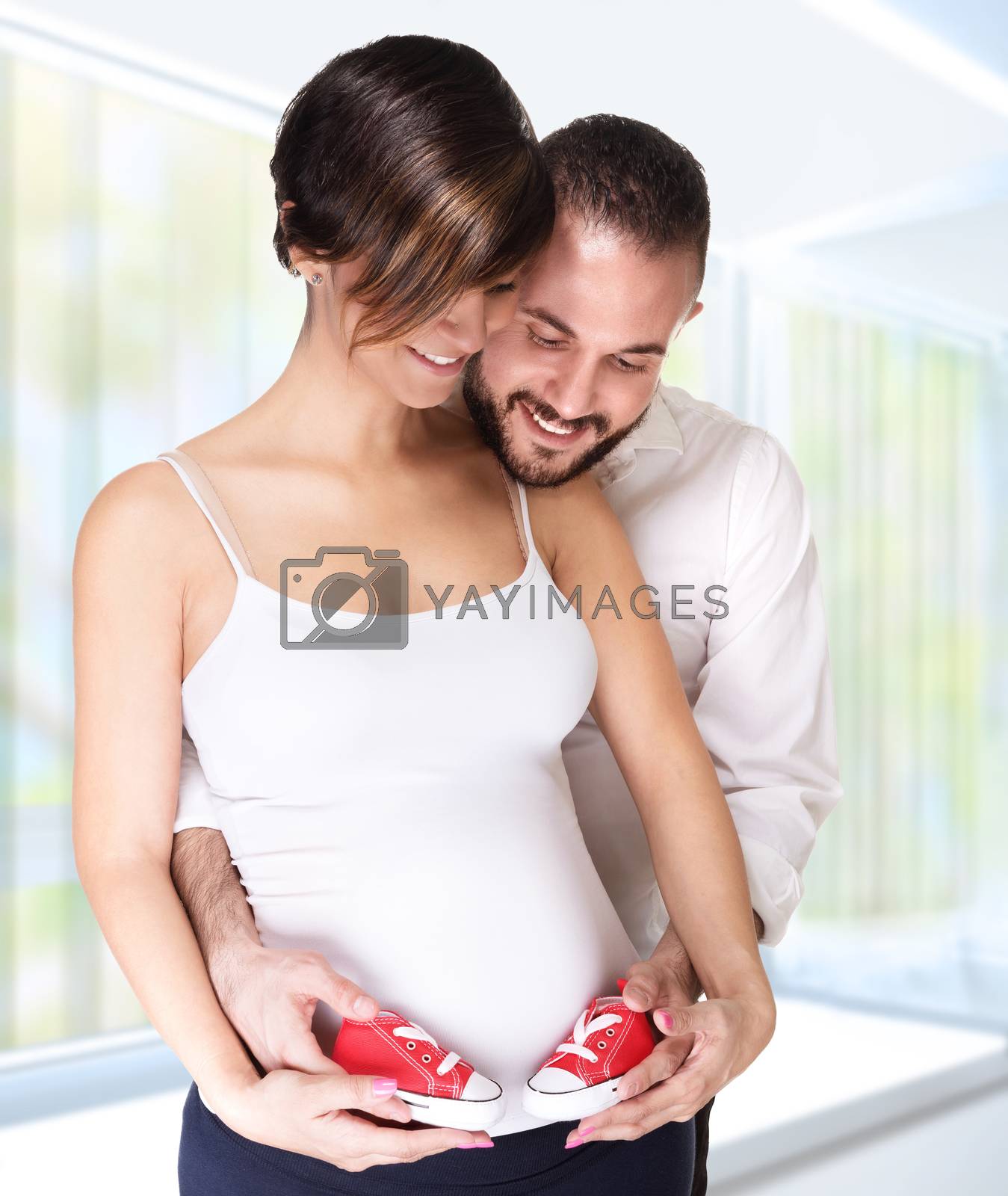 Royalty free image of Happy couple awaiting baby by Anna_Omelchenko