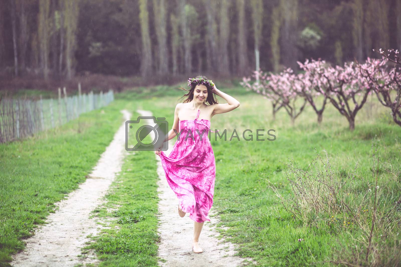 Royalty free image of Woman in spring garden by alenkasm