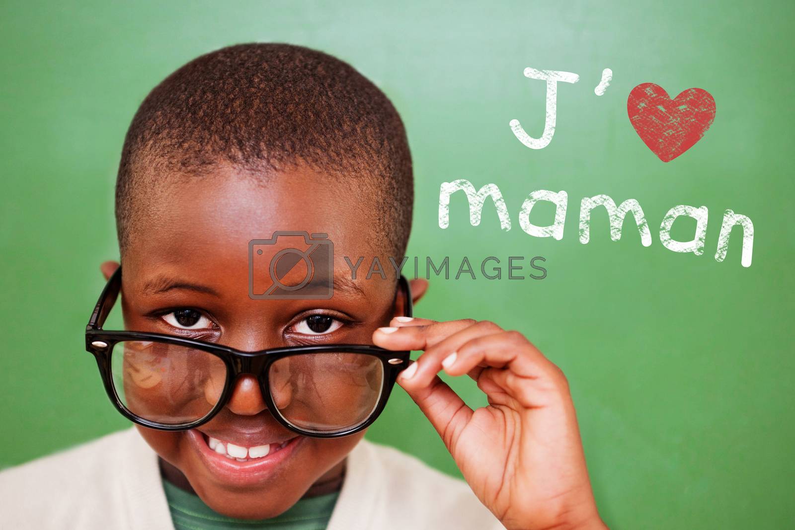 Royalty free image of Composite image of cute pupil tilting glasses by Wavebreakmedia