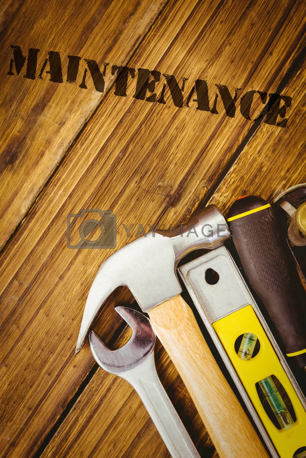 Royalty free image of Maintenance  against desk with tools by Wavebreakmedia