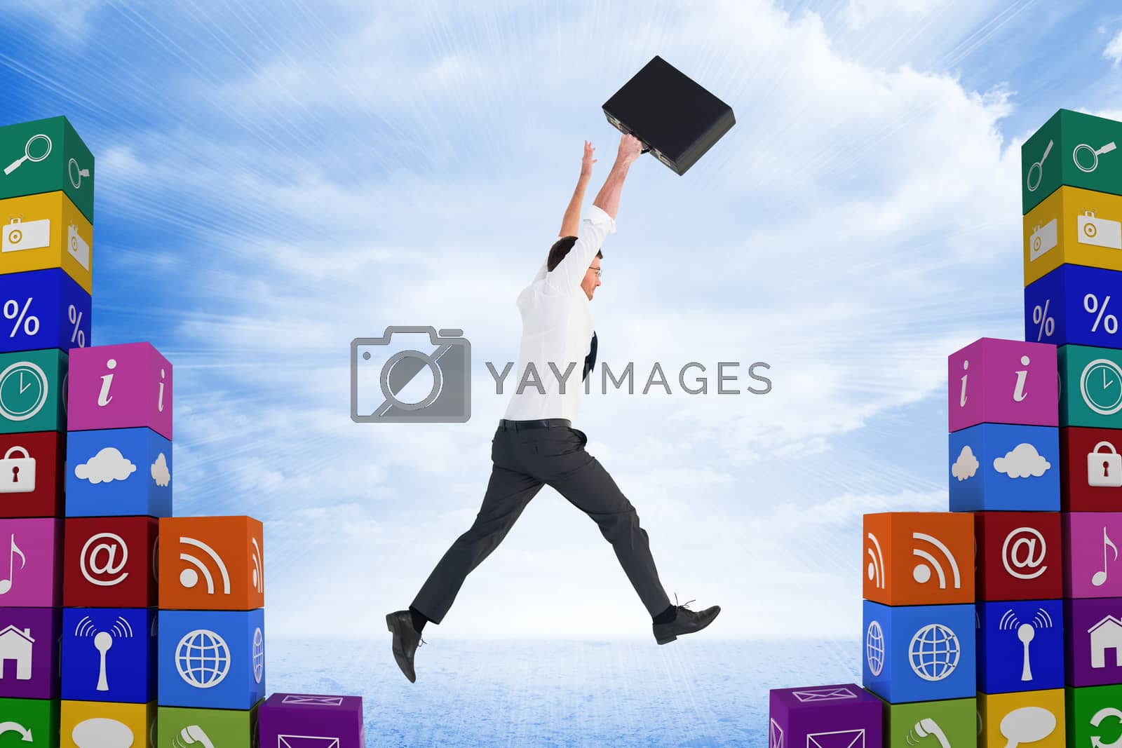 Royalty free image of Composite image of businessman leaping with his briefcase by Wavebreakmedia