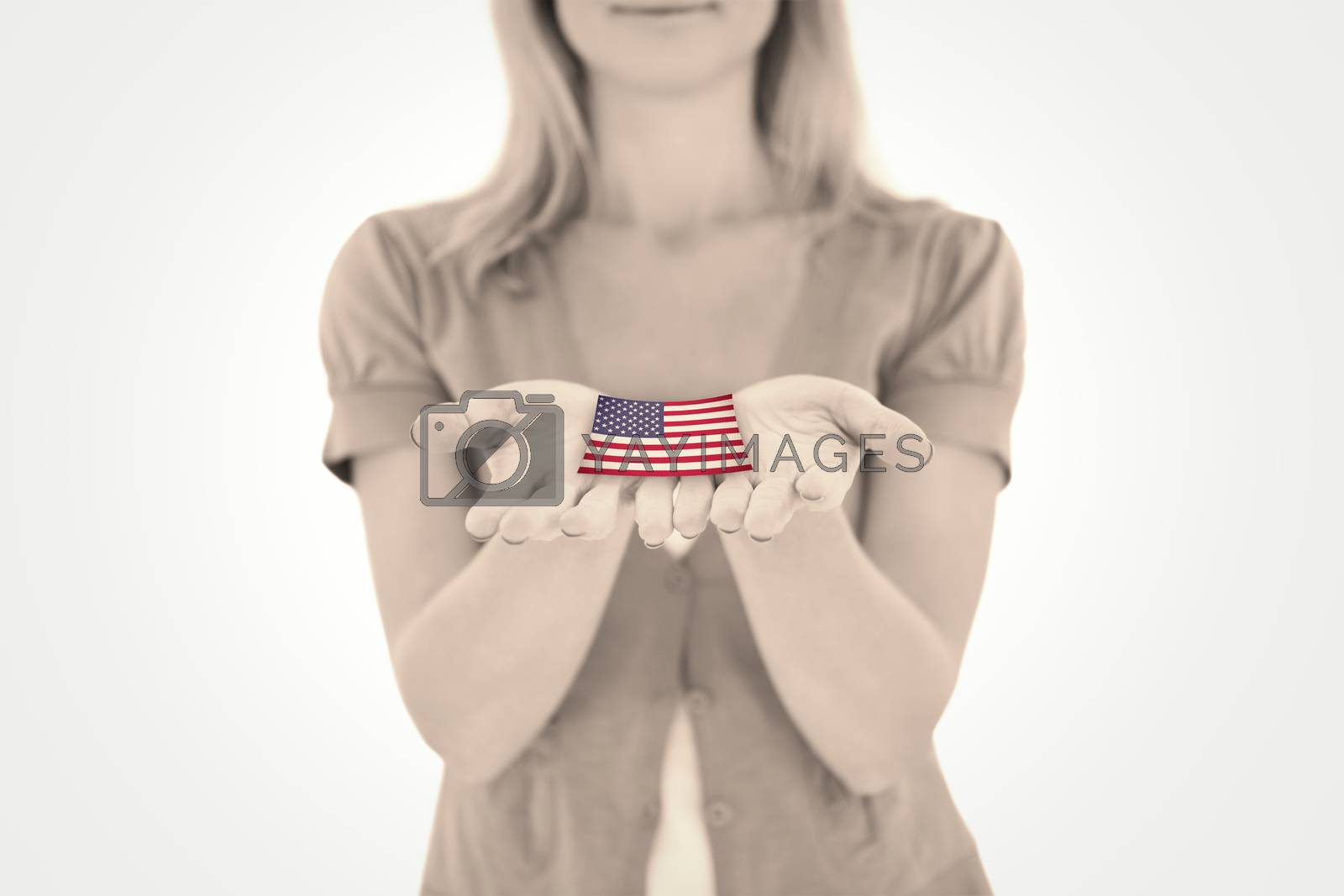 Royalty free image of Composite image of happy blonde holding our her hands by Wavebreakmedia