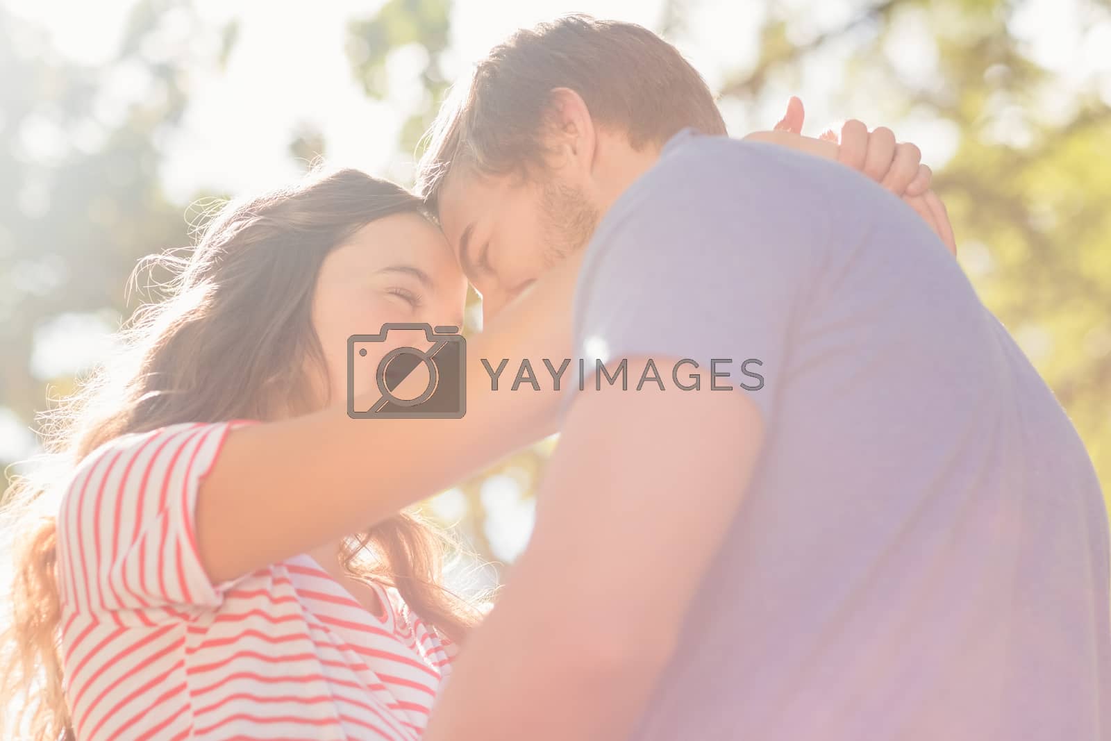 Royalty free image of Cute coupe smiling at each other in park  by Wavebreakmedia
