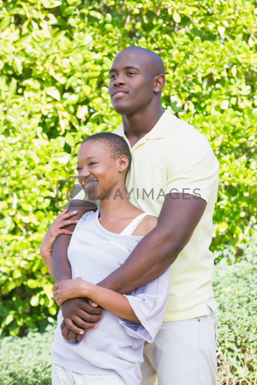 Royalty free image of Happy smiling couple to hug  by Wavebreakmedia