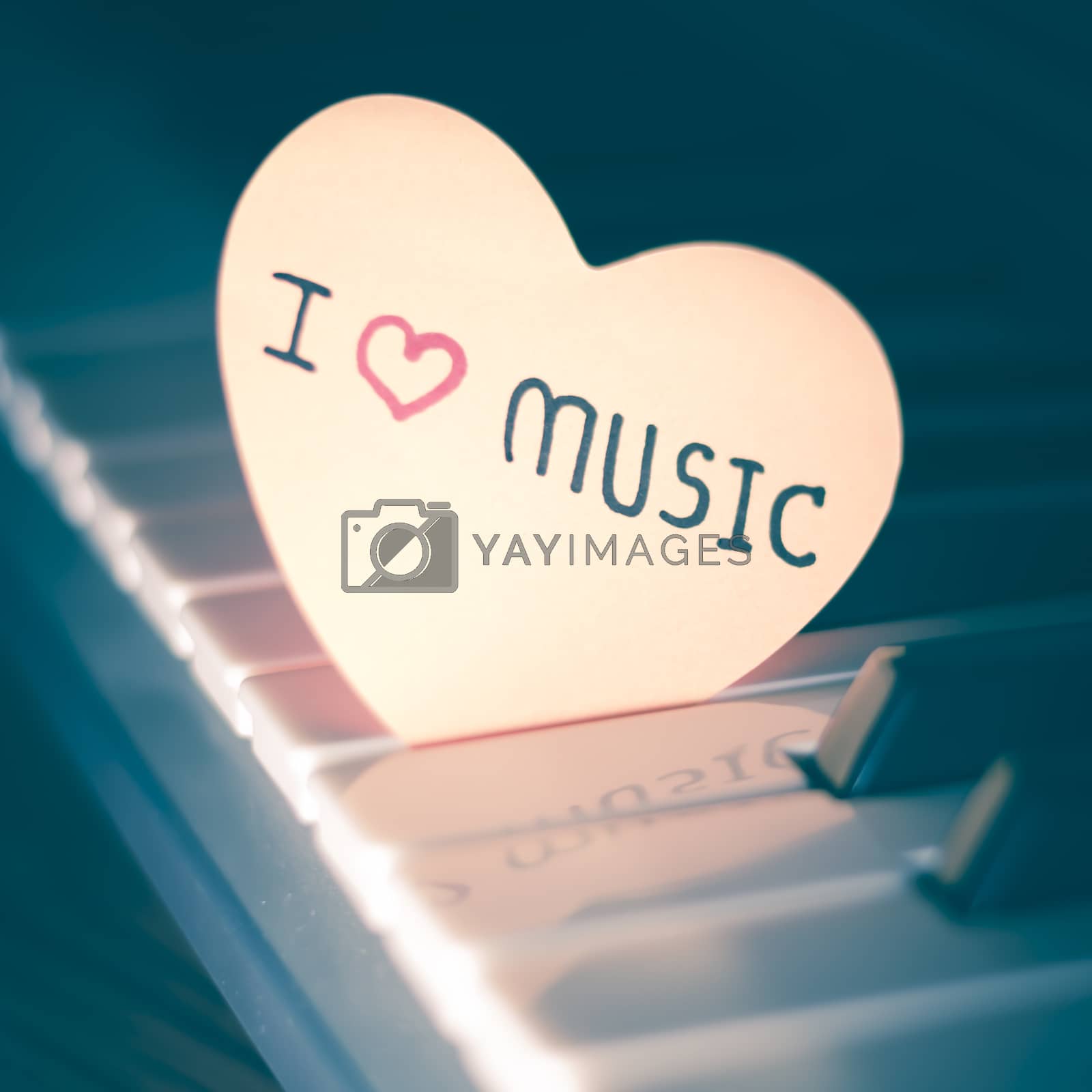 Royalty free image of piano and heart by ammza12