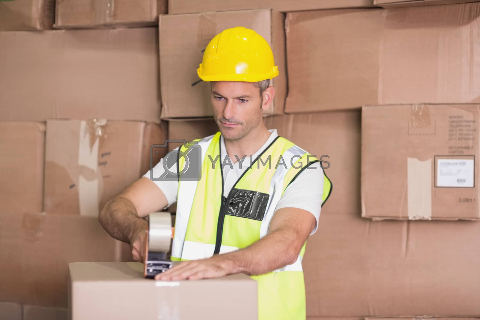 Royalty free image of Worker preparing goods for dispatch  by Wavebreakmedia