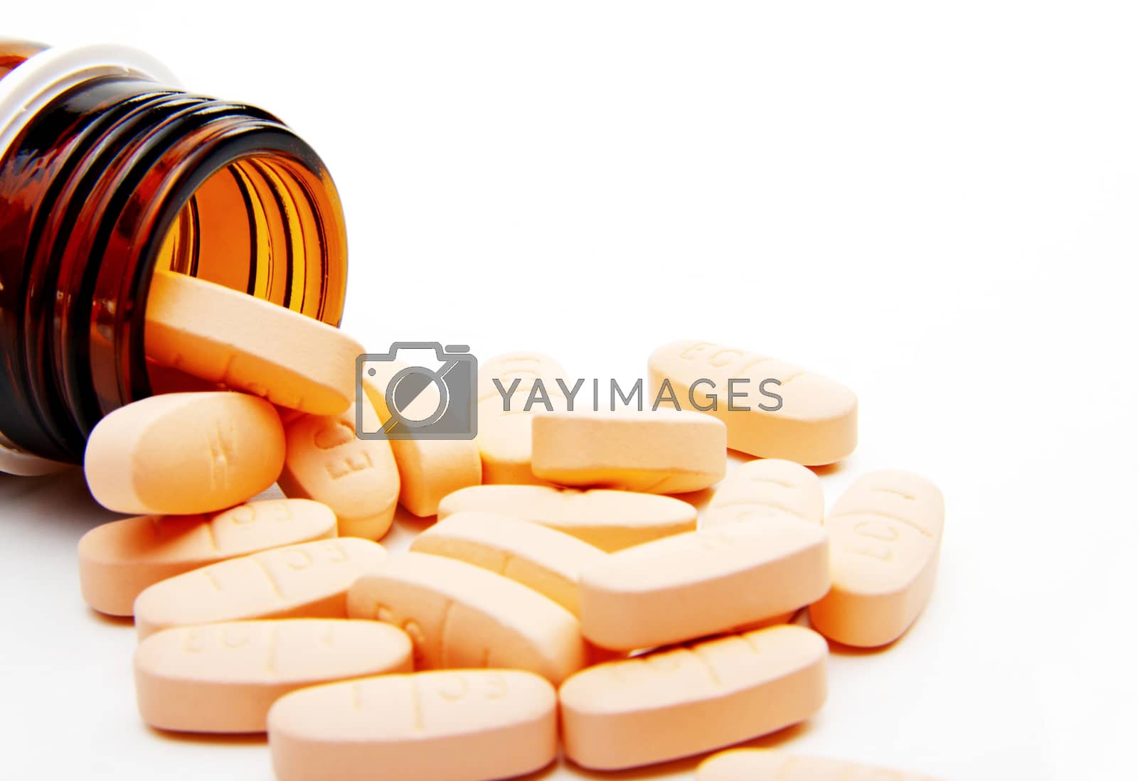 Royalty free image of Pills from bottle close-up by ozaiachin