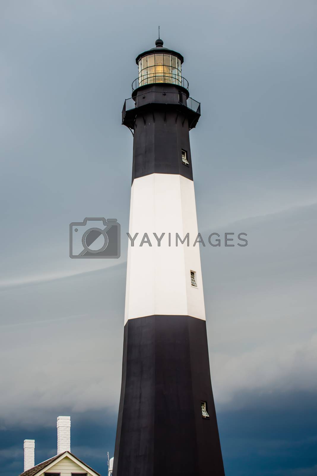 Royalty free image of Tybee Island Light with storm approaching by digidreamgrafix