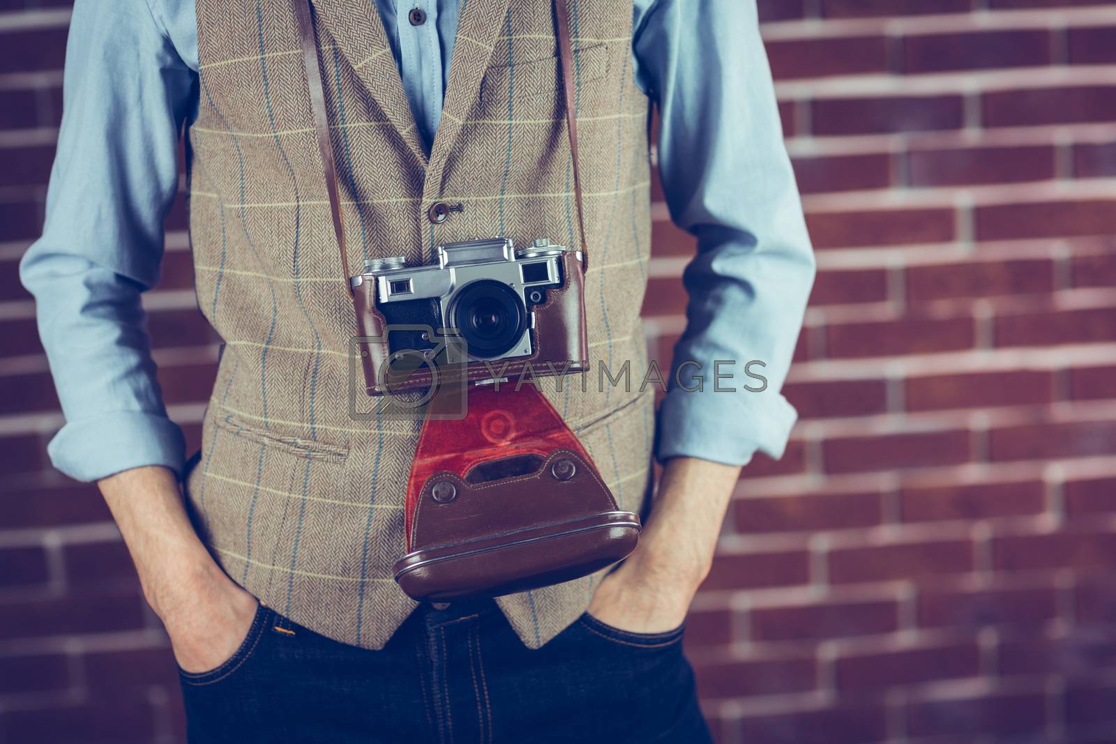 Royalty free image of Midsection of photographer by Wavebreakmedia