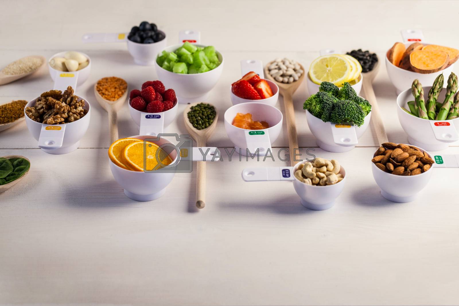 Royalty free image of Portion cups of healthy ingredients by Wavebreakmedia