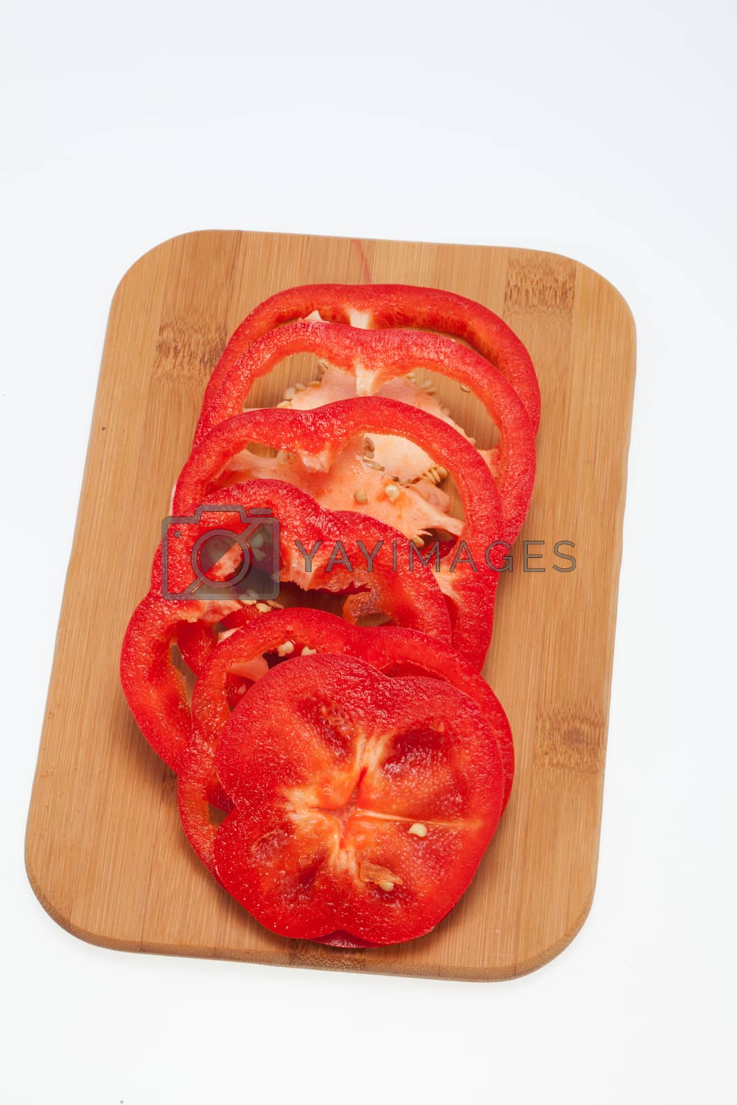 Royalty free image of Sliced red pepper isolated on white background by wjarek