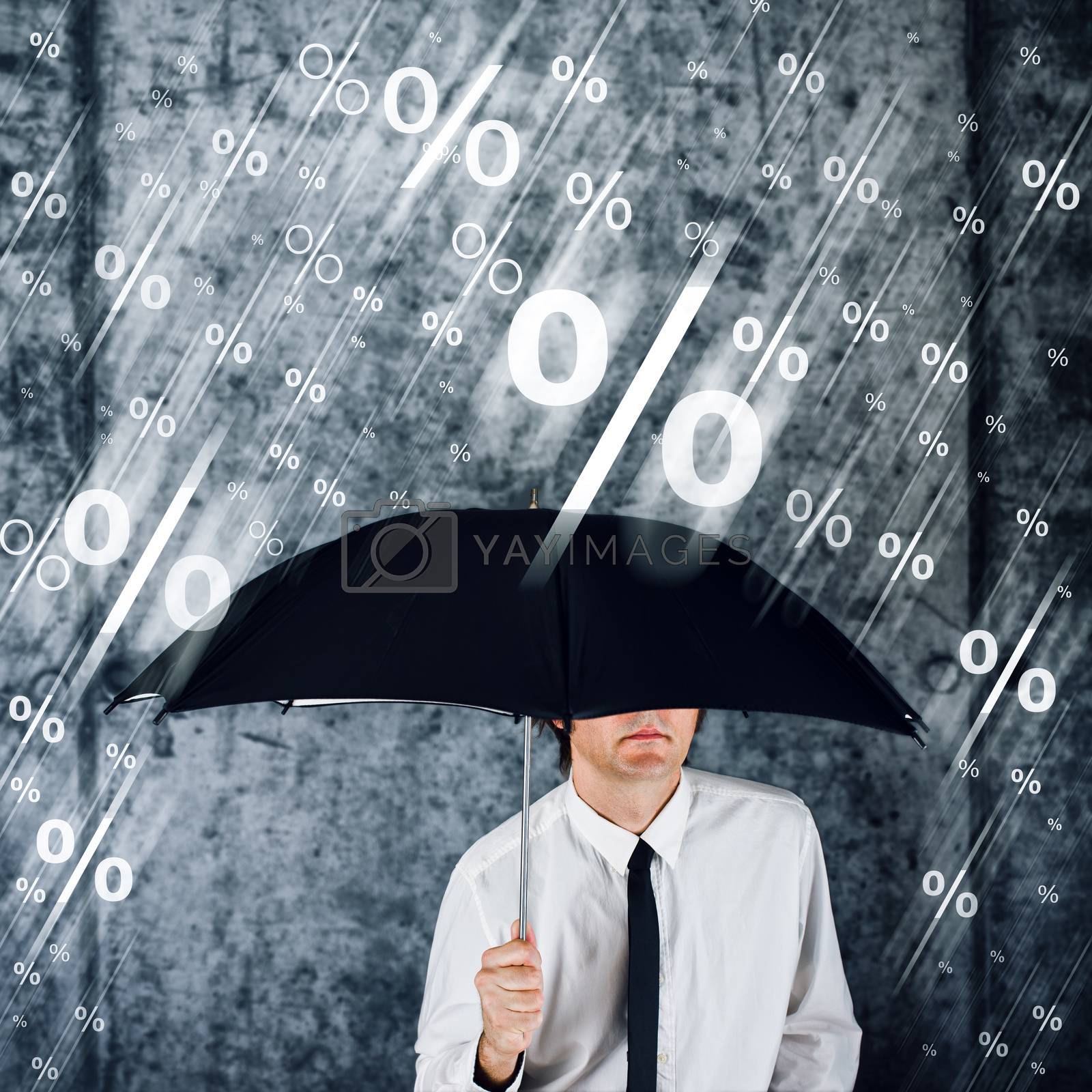 Royalty free image of Businessman with umbrella protecting himself from percentage rai by stevanovicigor