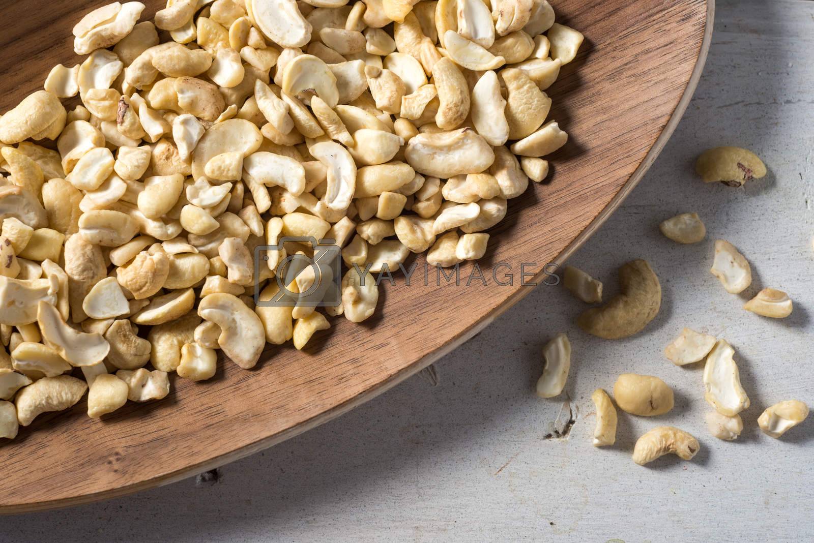 Royalty free image of Bowl of cashew pieces healthy protein snack  by Boyrcr420