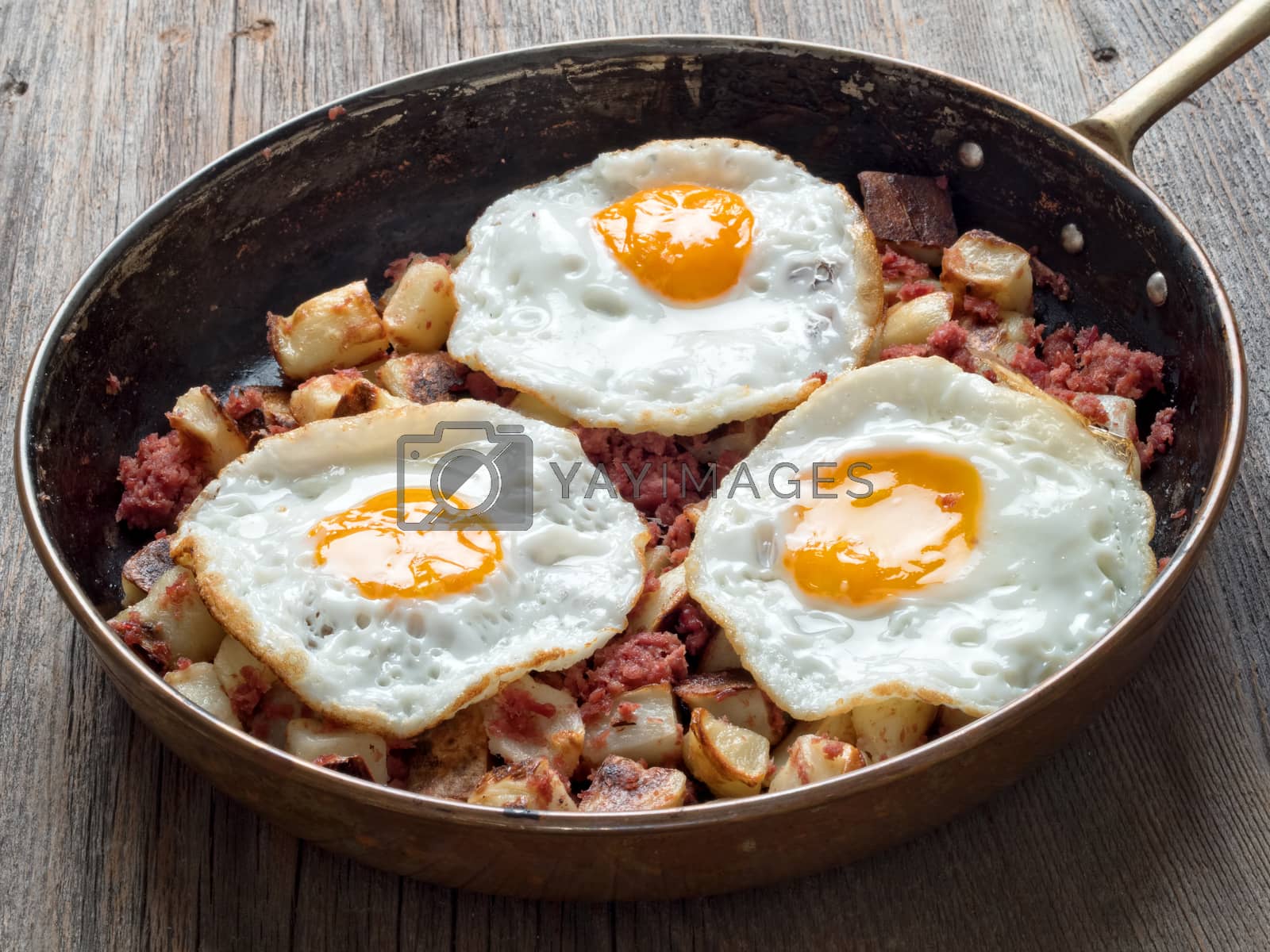 Royalty free image of rustic corned beef hash by zkruger