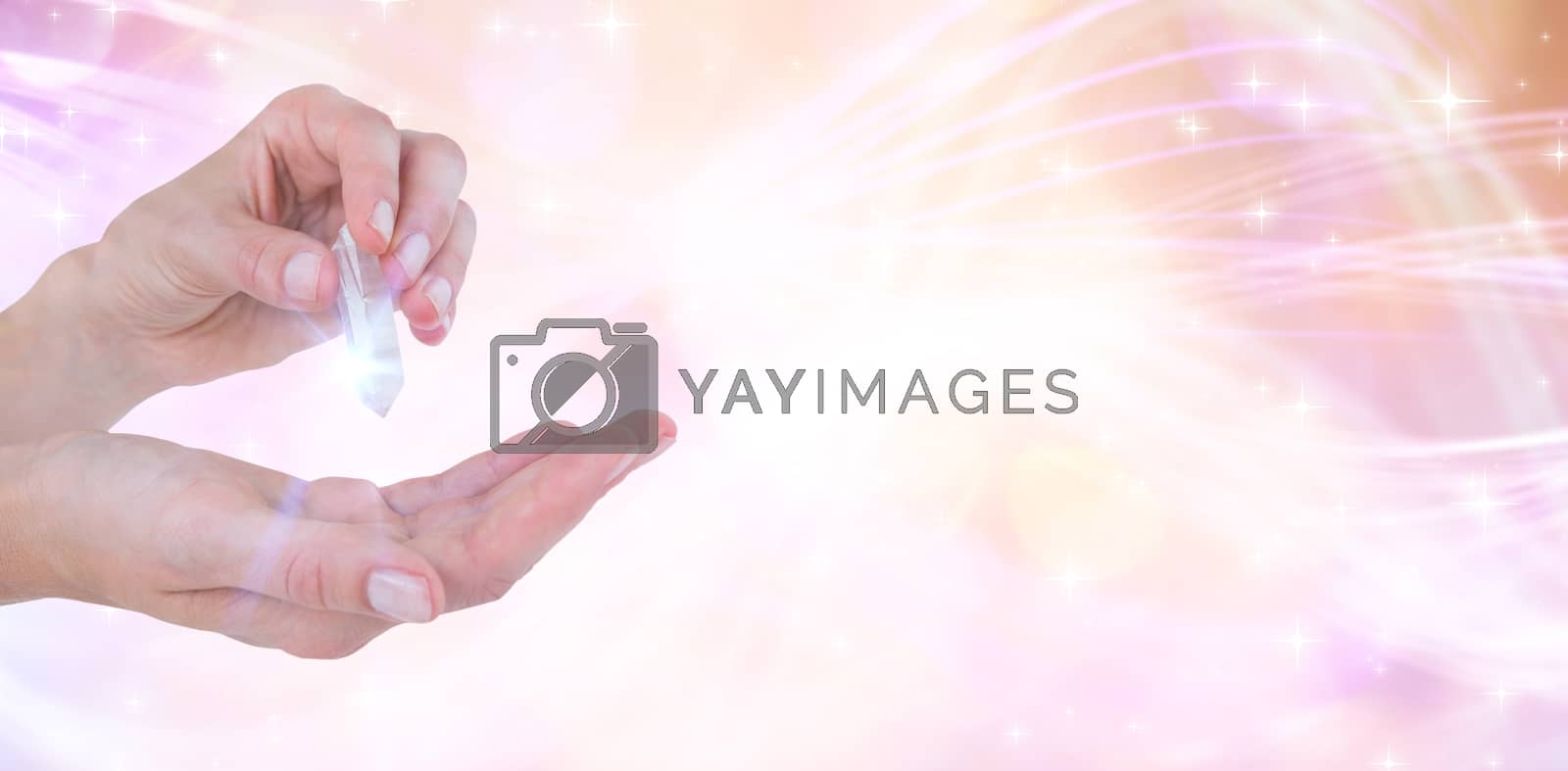 Royalty free image of Composite image of woman holding precious gem by Wavebreakmedia