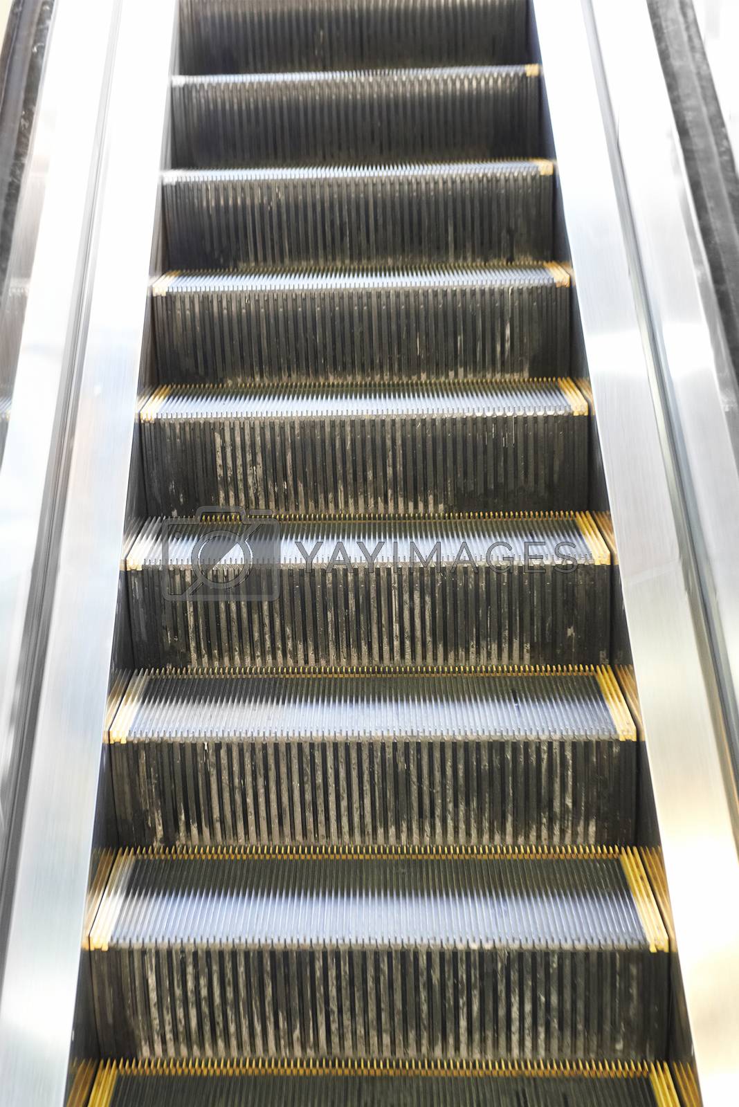 Royalty free image of Empty escalator stairs by vapi