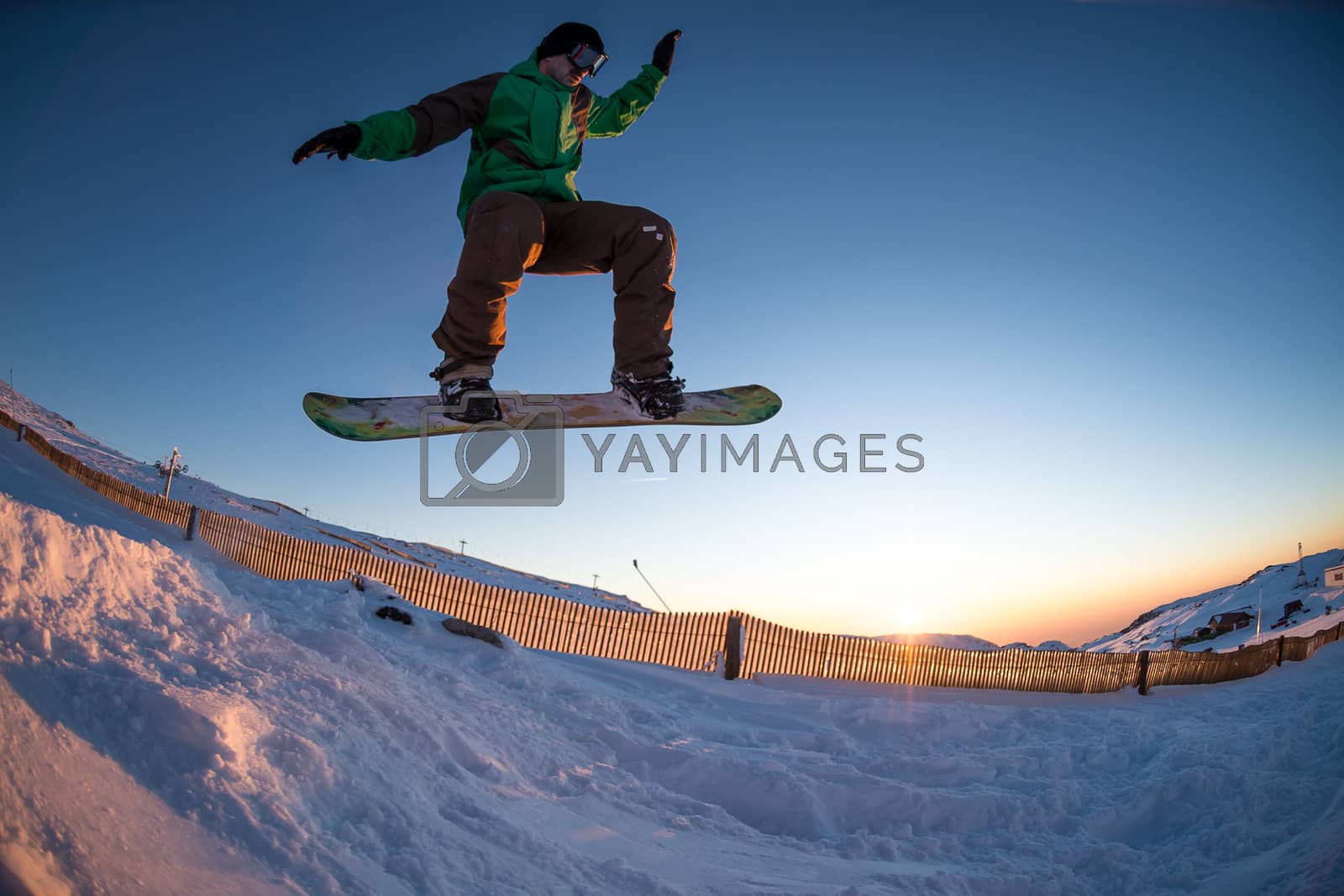 Royalty free image of Snowboarding in the mountains by homydesign