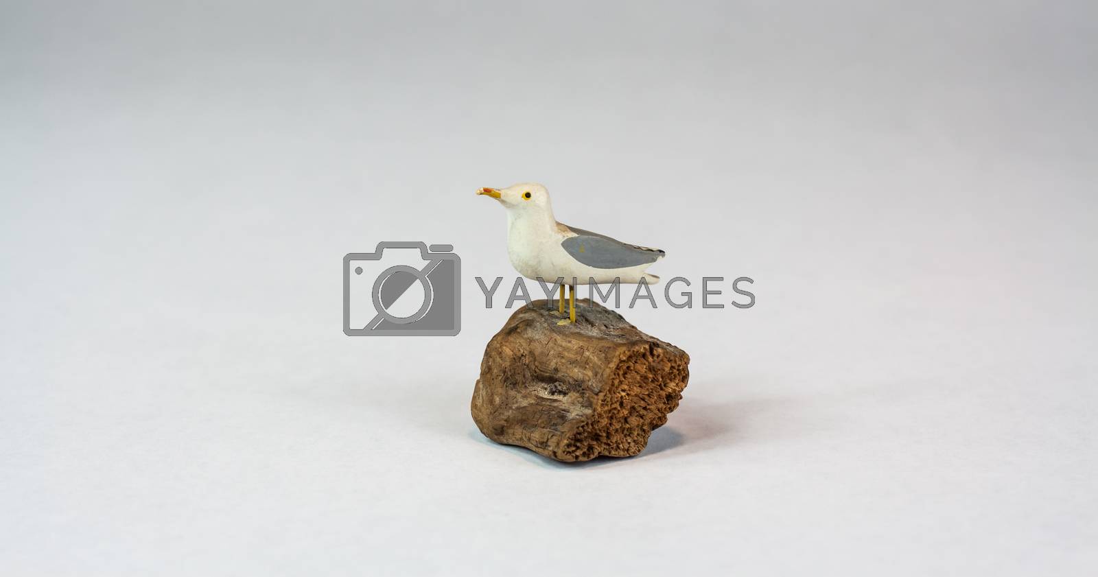 Royalty free image of wooden sea gull statue by TravisPhotoWorks
