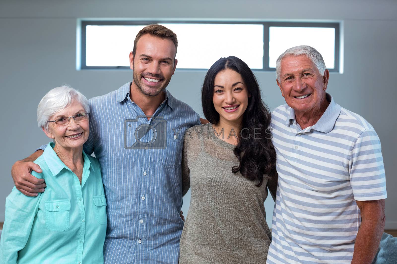 Royalty free image of Young couple with their grandparents by Wavebreakmedia