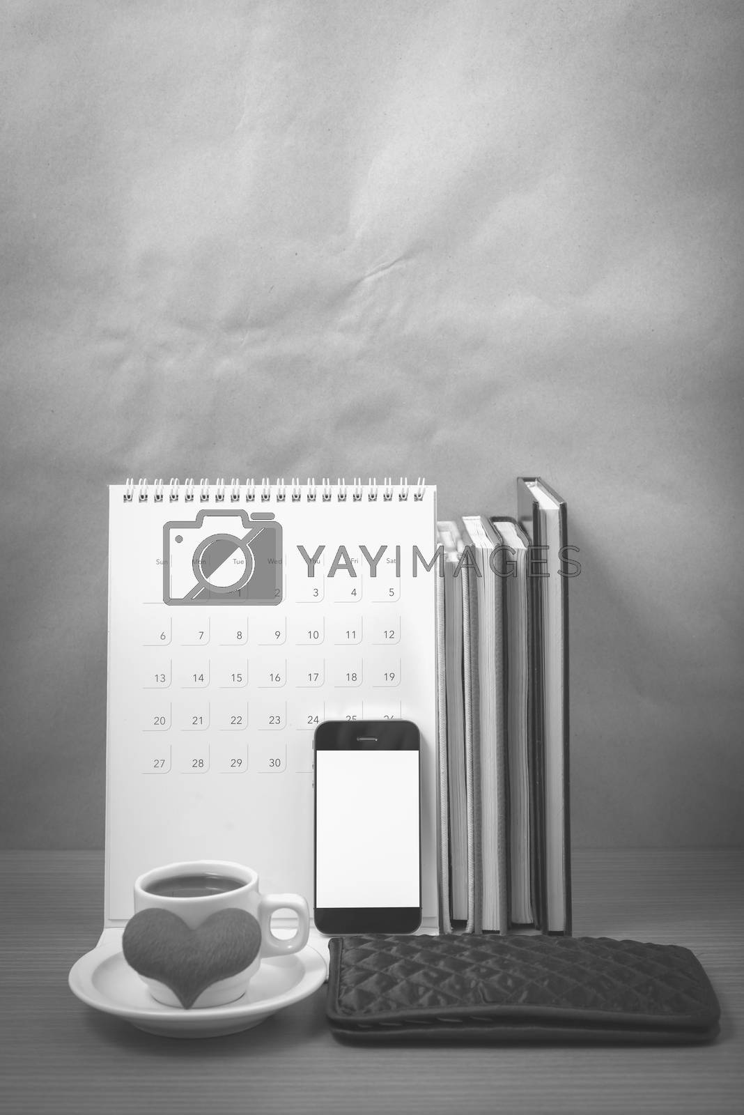 Royalty free image of office desk : coffee with phone,wallet,calendar,heart,stack of b by ammza12