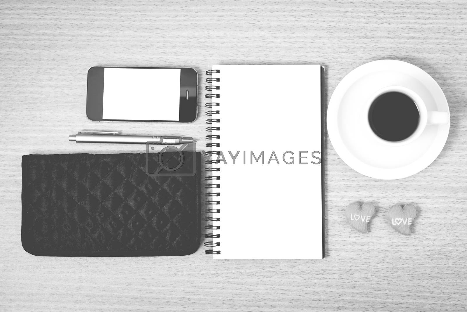 Royalty free image of working table : coffee with phone,notepad,wallet and red heart b by ammza12