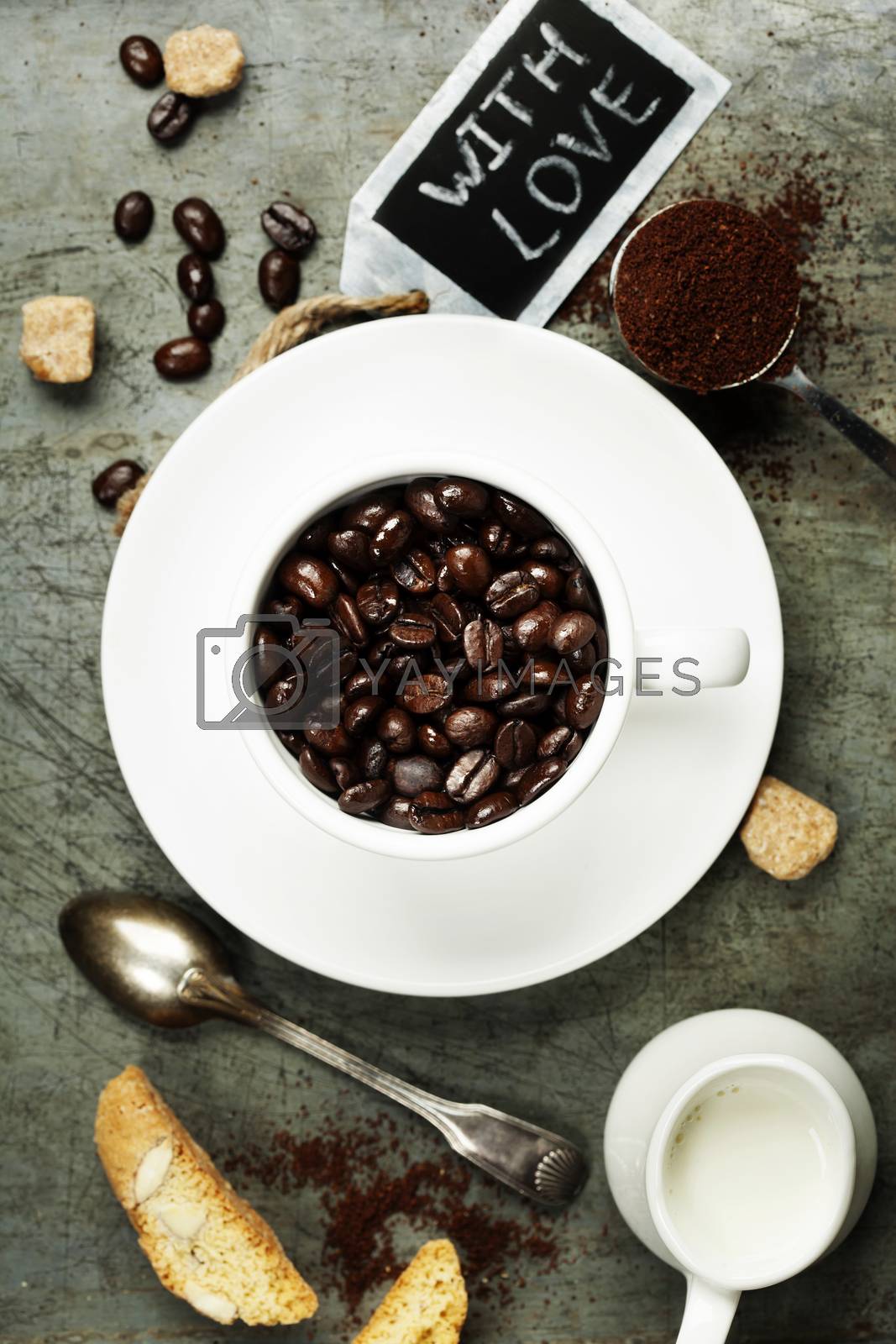 Royalty free image of Coffee cup with beans by klenova