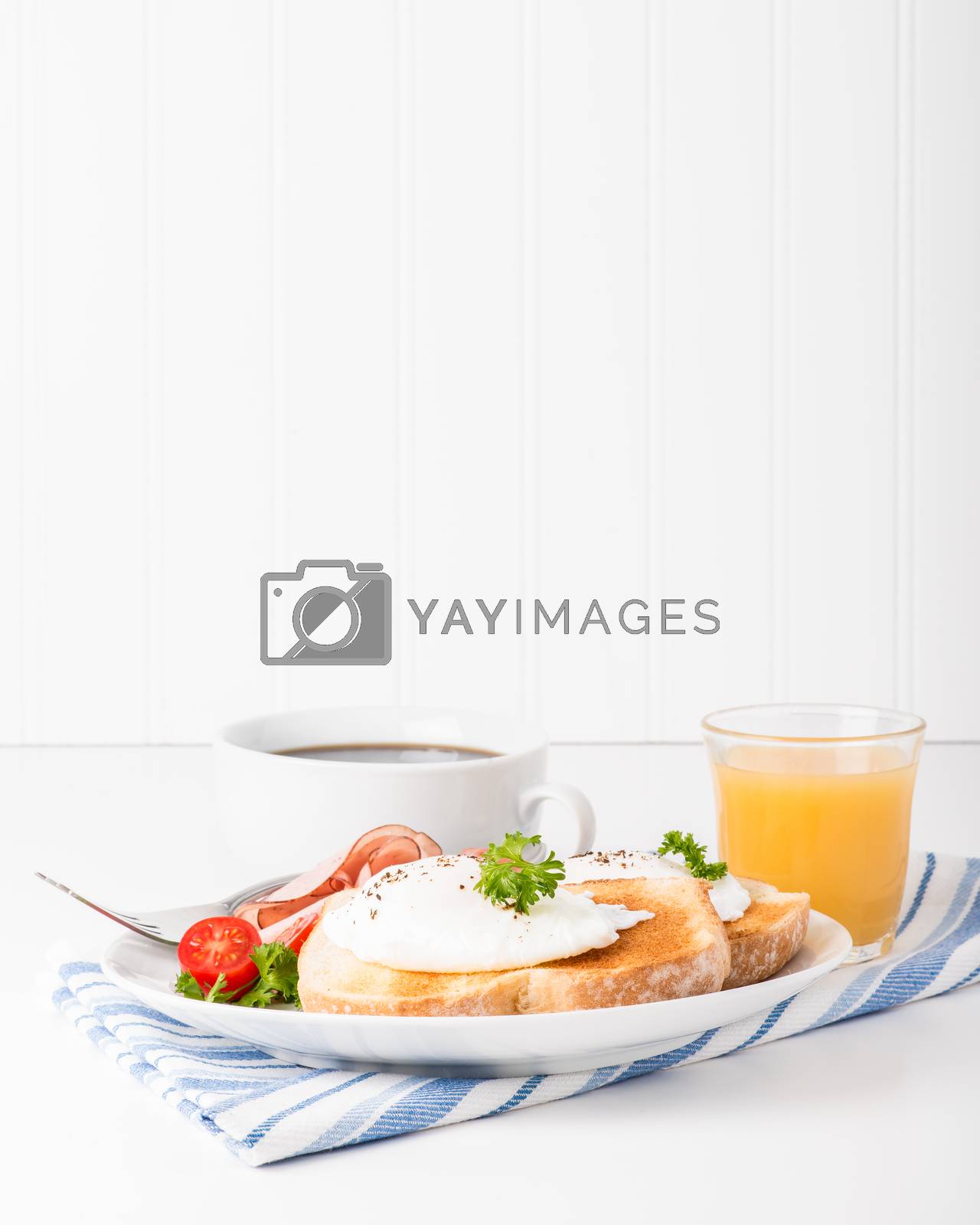 Royalty free image of Poached Eggs Portrait by billberryphotography