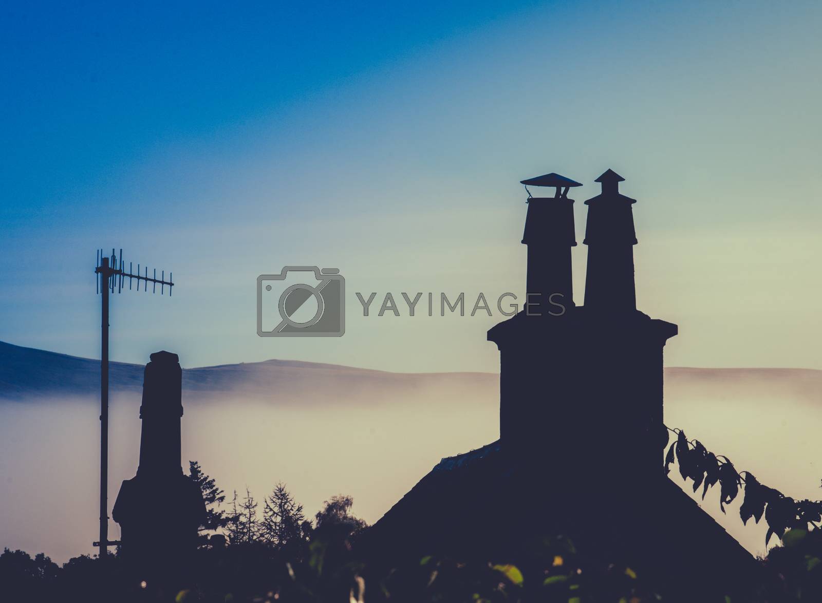 Royalty free image of Retro Rural Rooftop At Dusk by mrdoomits