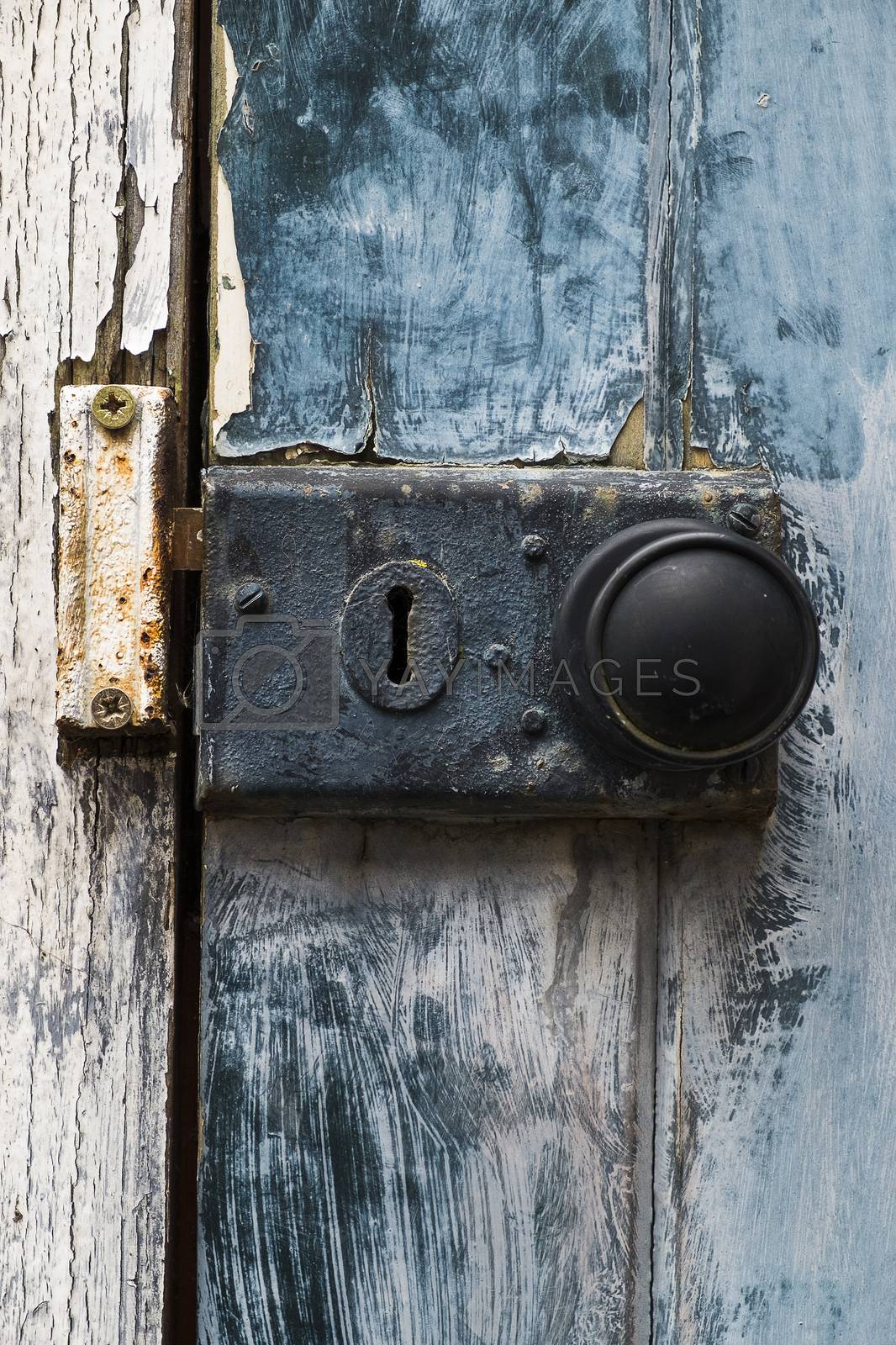 Royalty free image of weathered old lock and door by sijohnsen