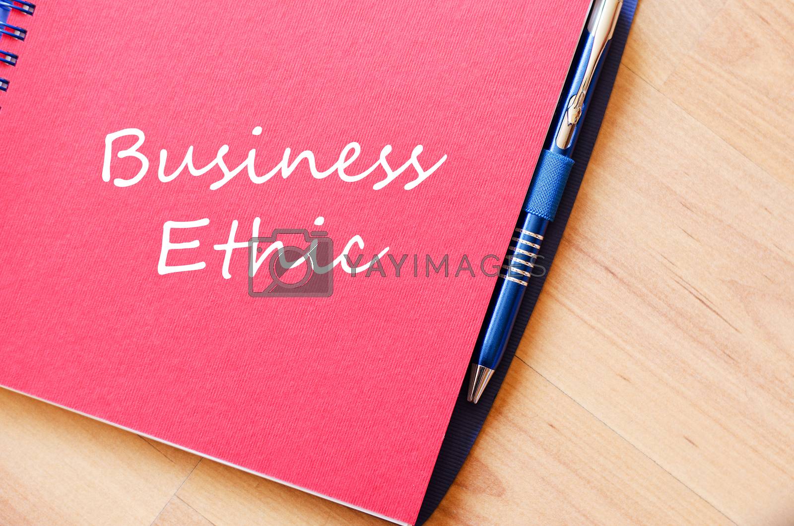 Royalty free image of Business ethic write on notebook by eenevski