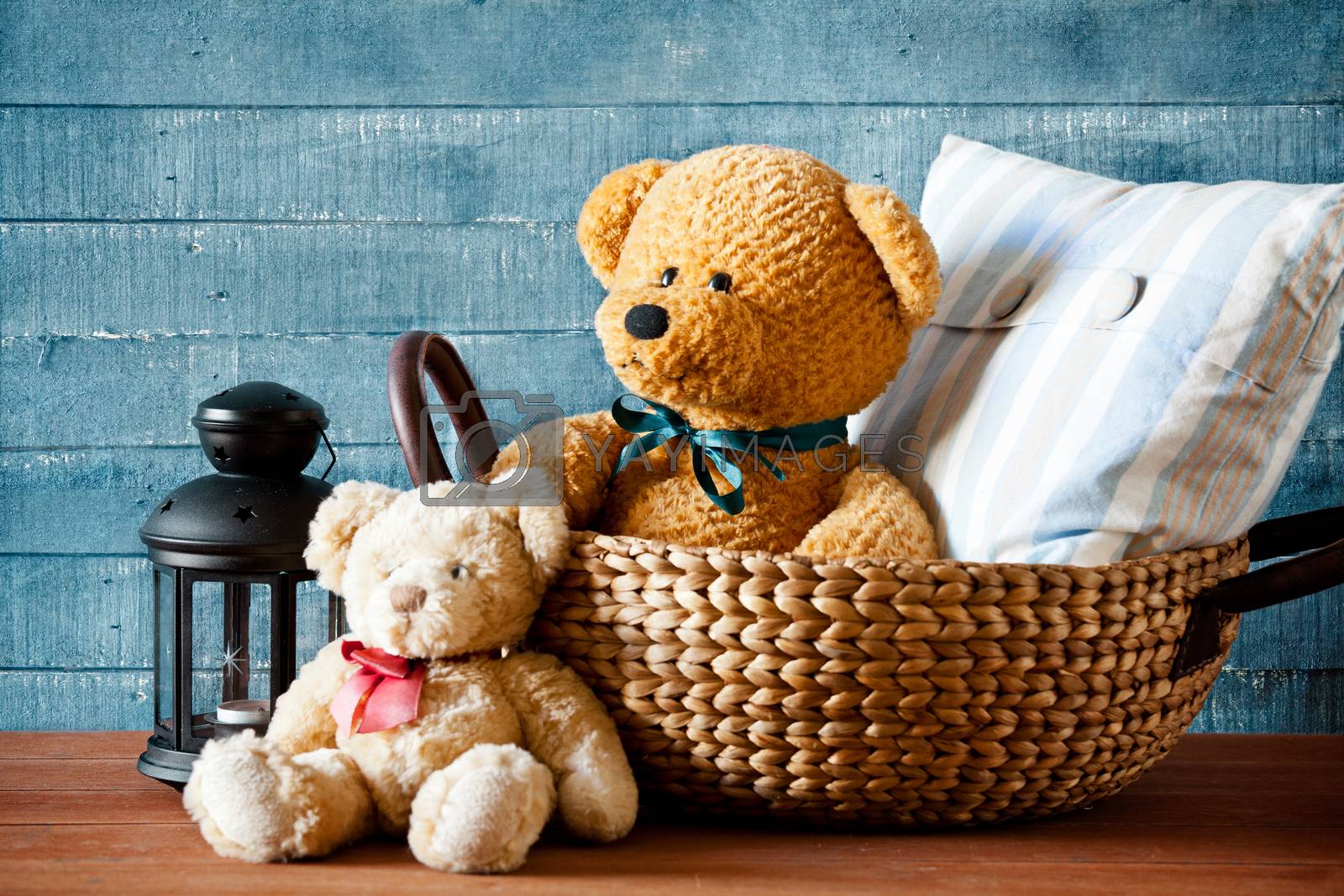 Royalty free image of Cute Teddy Bear In A Basket by mpessaris