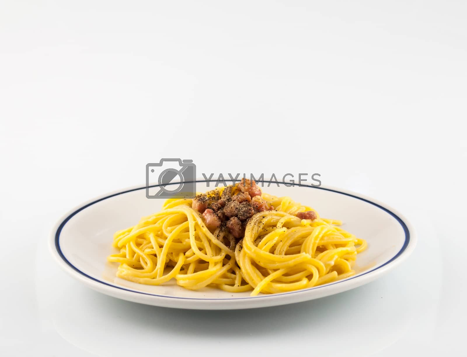 Royalty free image of spaghetti with a bacon, egg and cheese sauce by replica