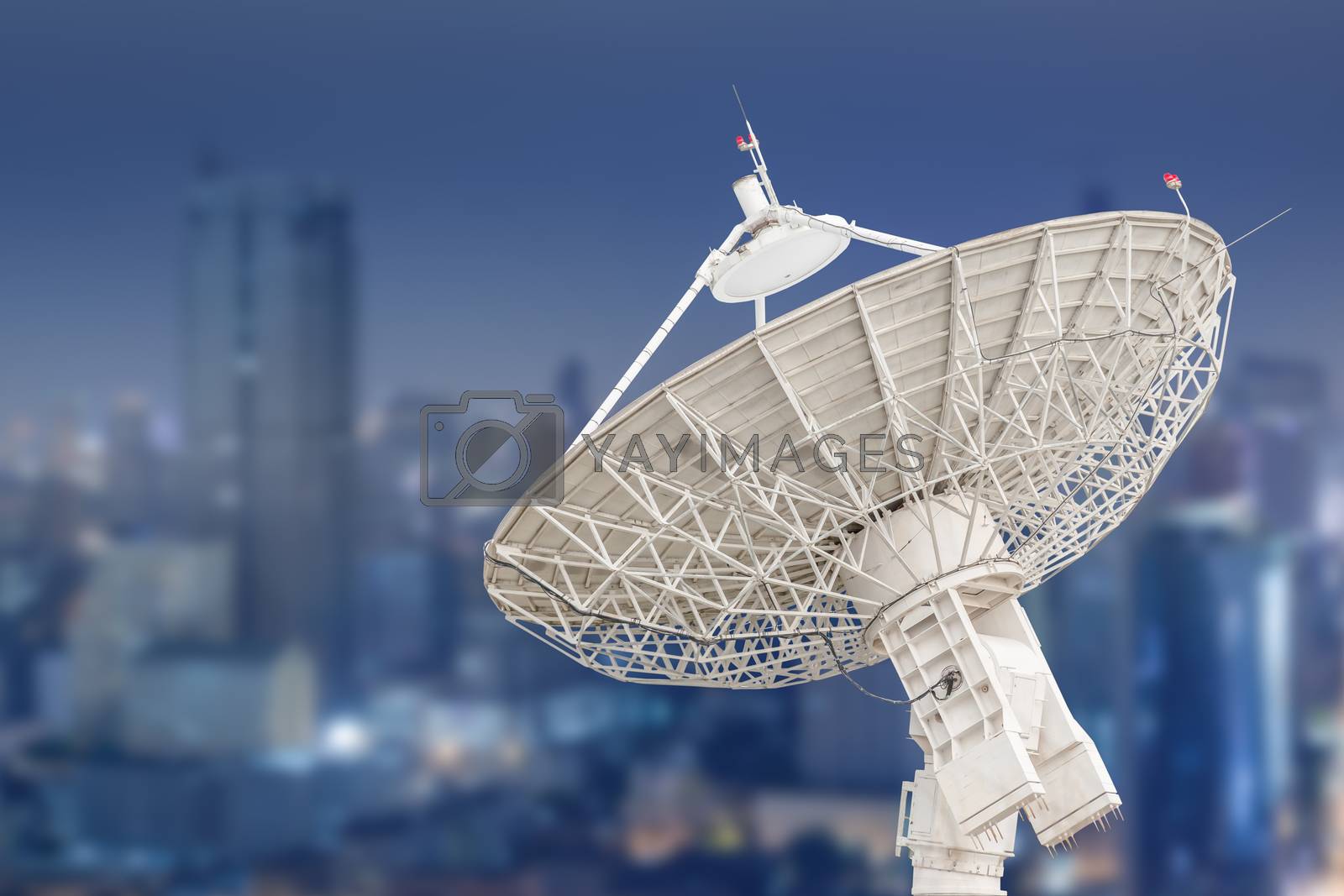 Royalty free image of satellite dish antenna radar and building background by FrameAngel