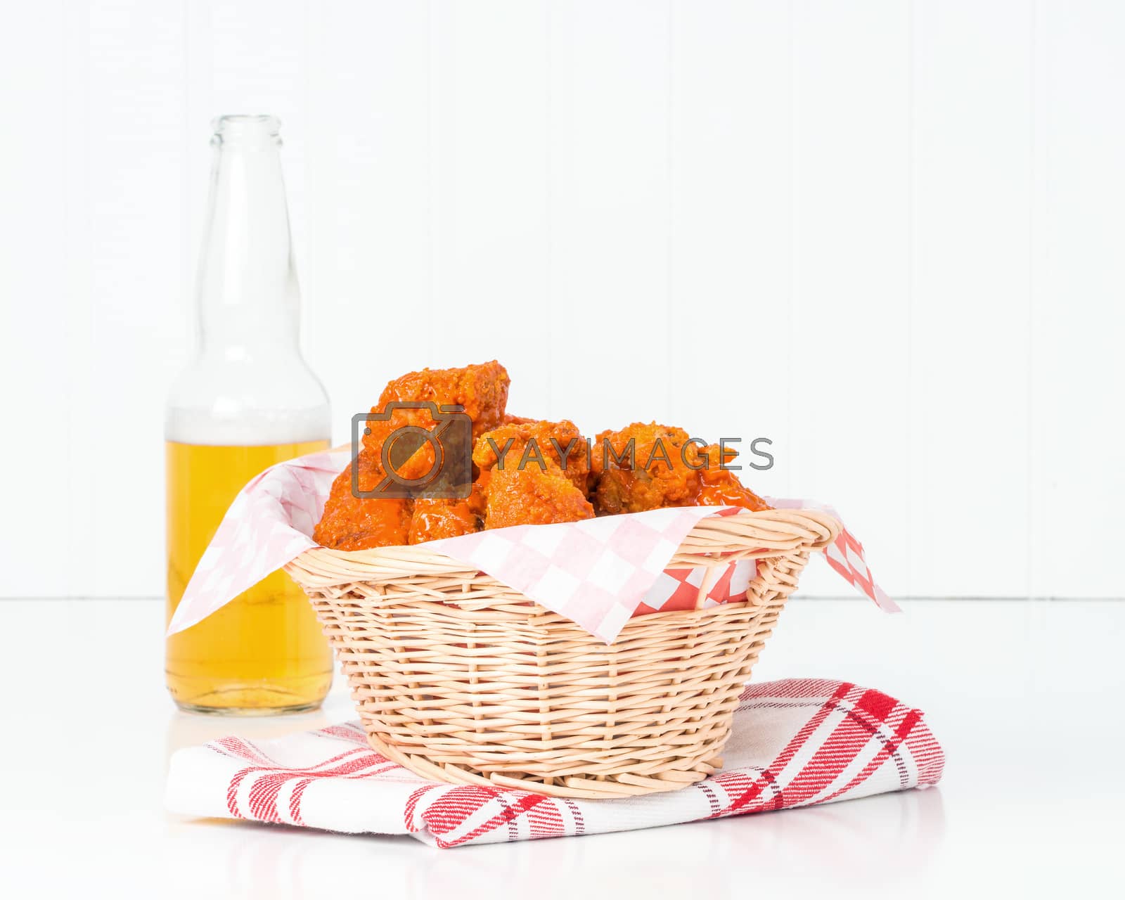 Royalty free image of Buffalo Wing Basket by billberryphotography