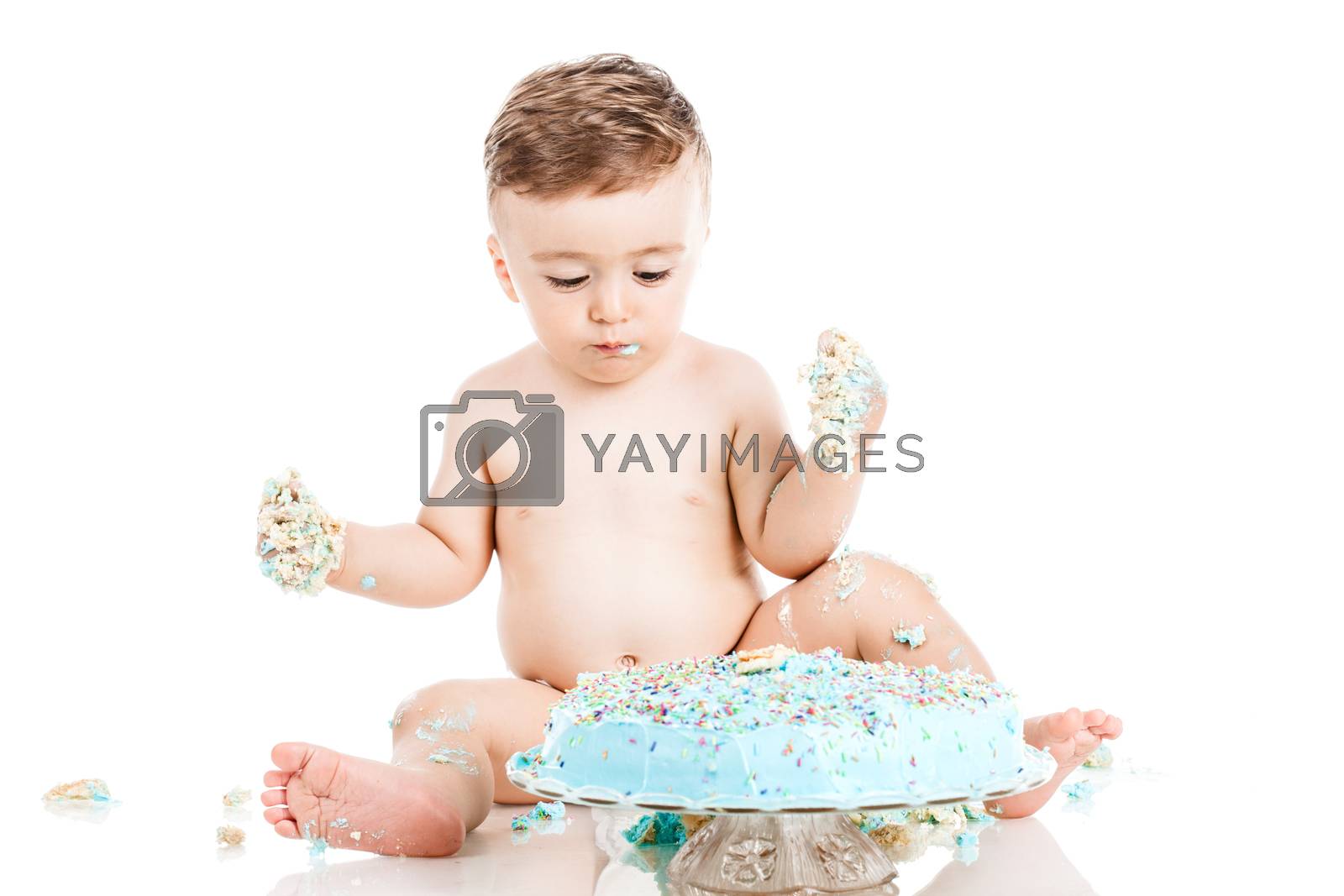 Royalty free image of baby boy with a cake by kokimk